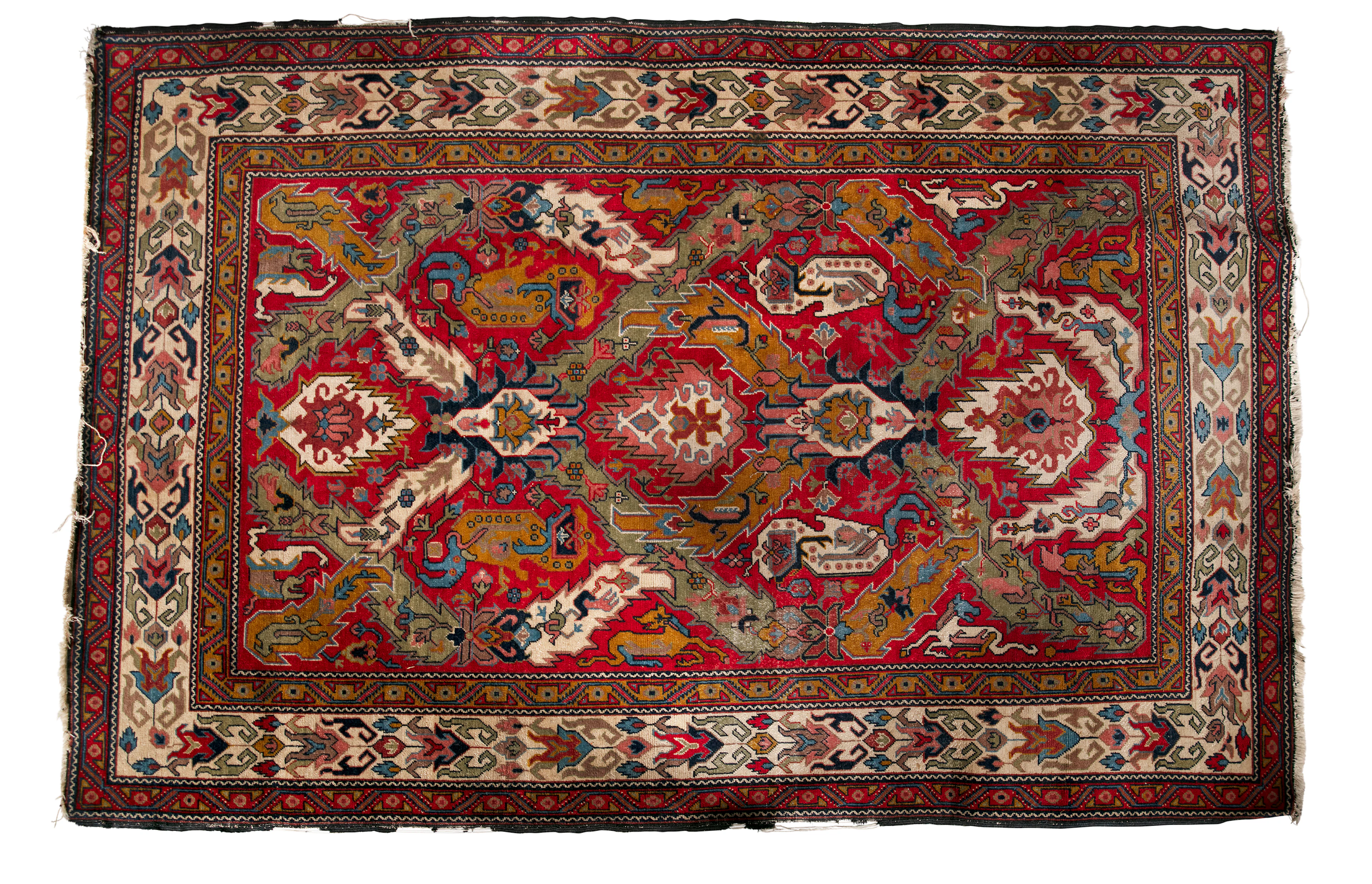 A PERSIAN RED GROUND WOOL RUG