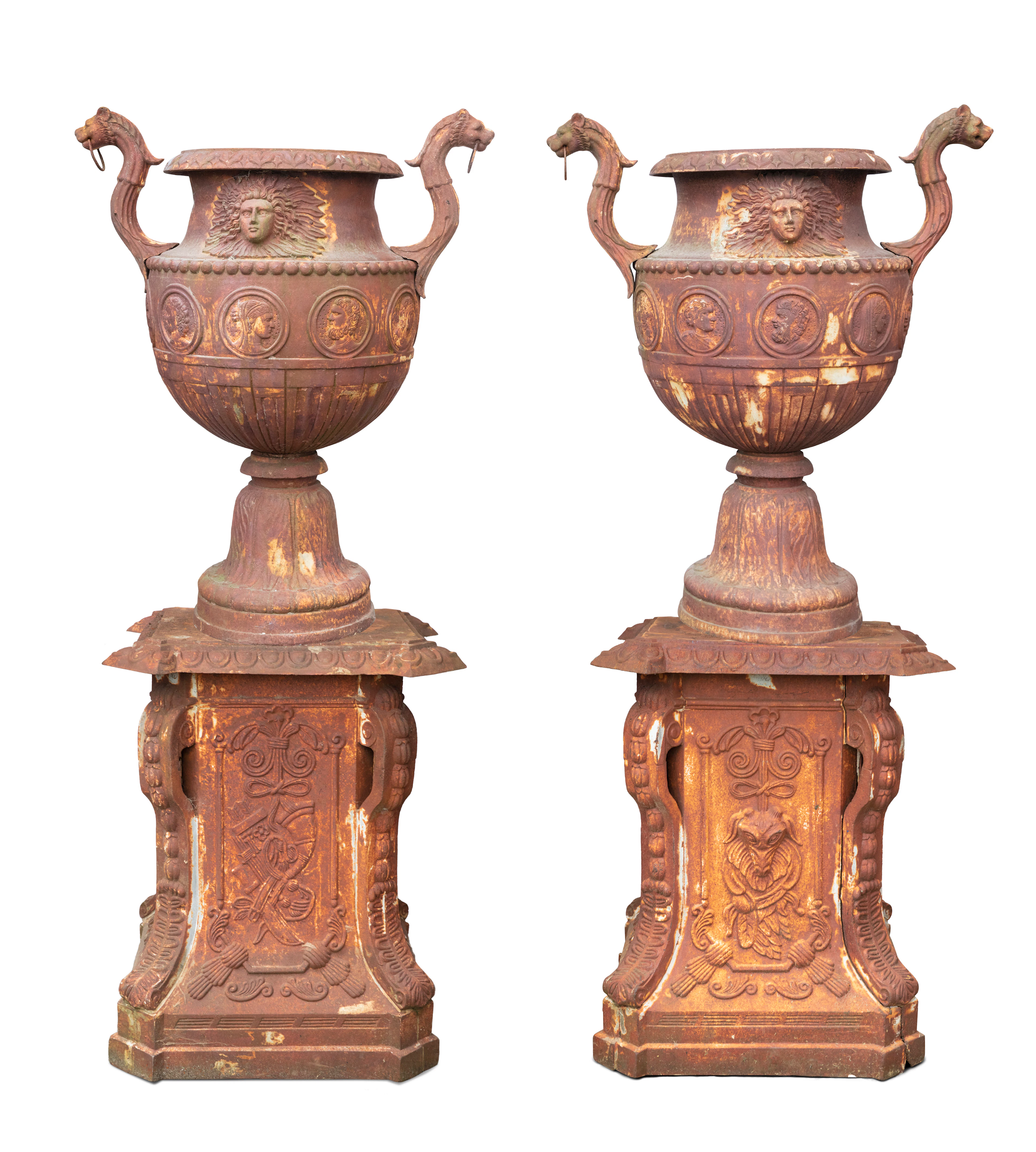 A PAIR OF MONUMENTAL FRENCH CAST IRON URNS AND PEDESTALS
