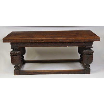 Lot 2492 - An antique oak drawleaf refectory table