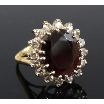 Lot 2175 - A yellow and white metal, garnet and