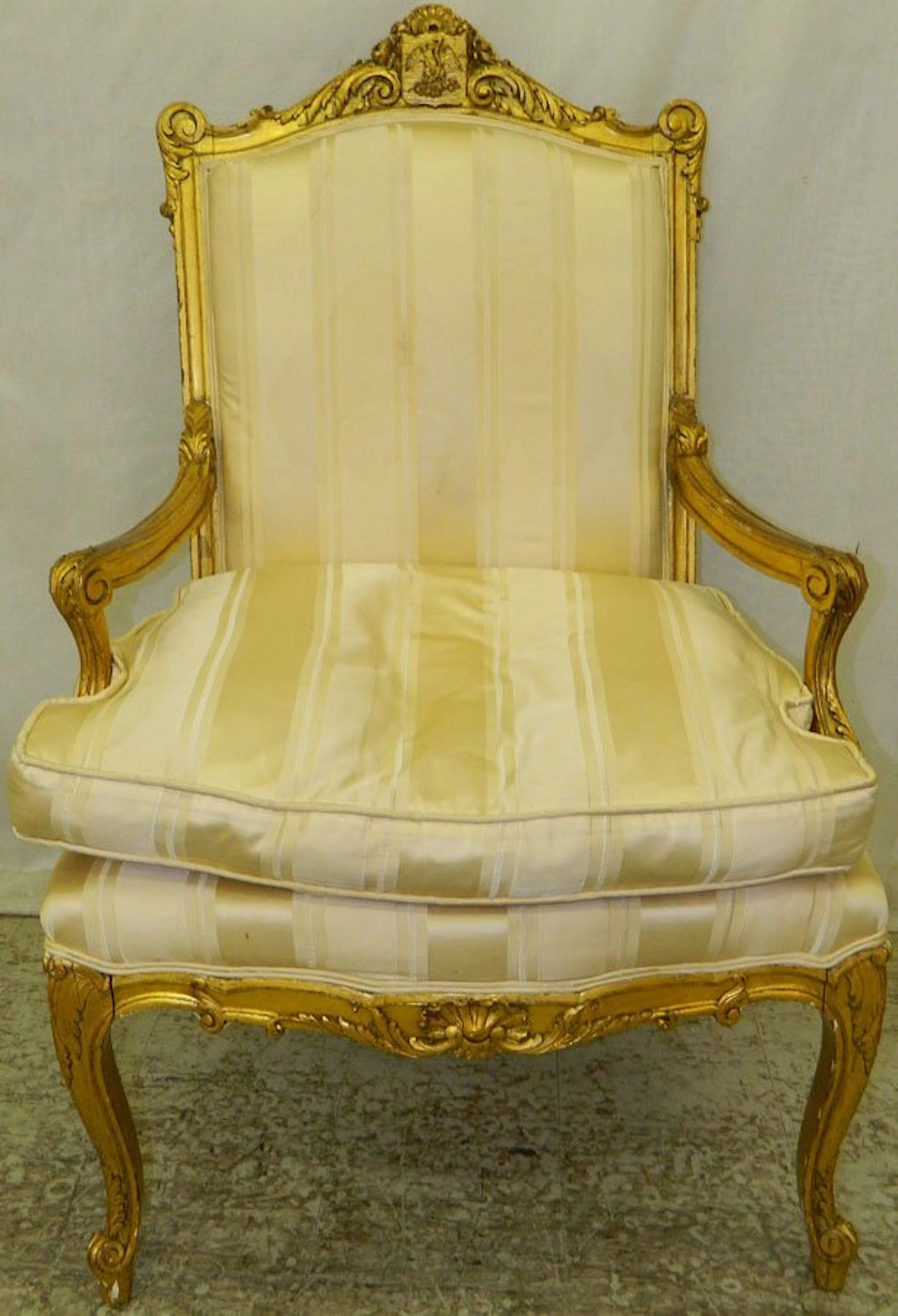 Very fine carved gold leaf French arm chair.