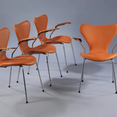 Arne Jacobsen. Set of four armchairs, 'Syveren', aniline leather and ...