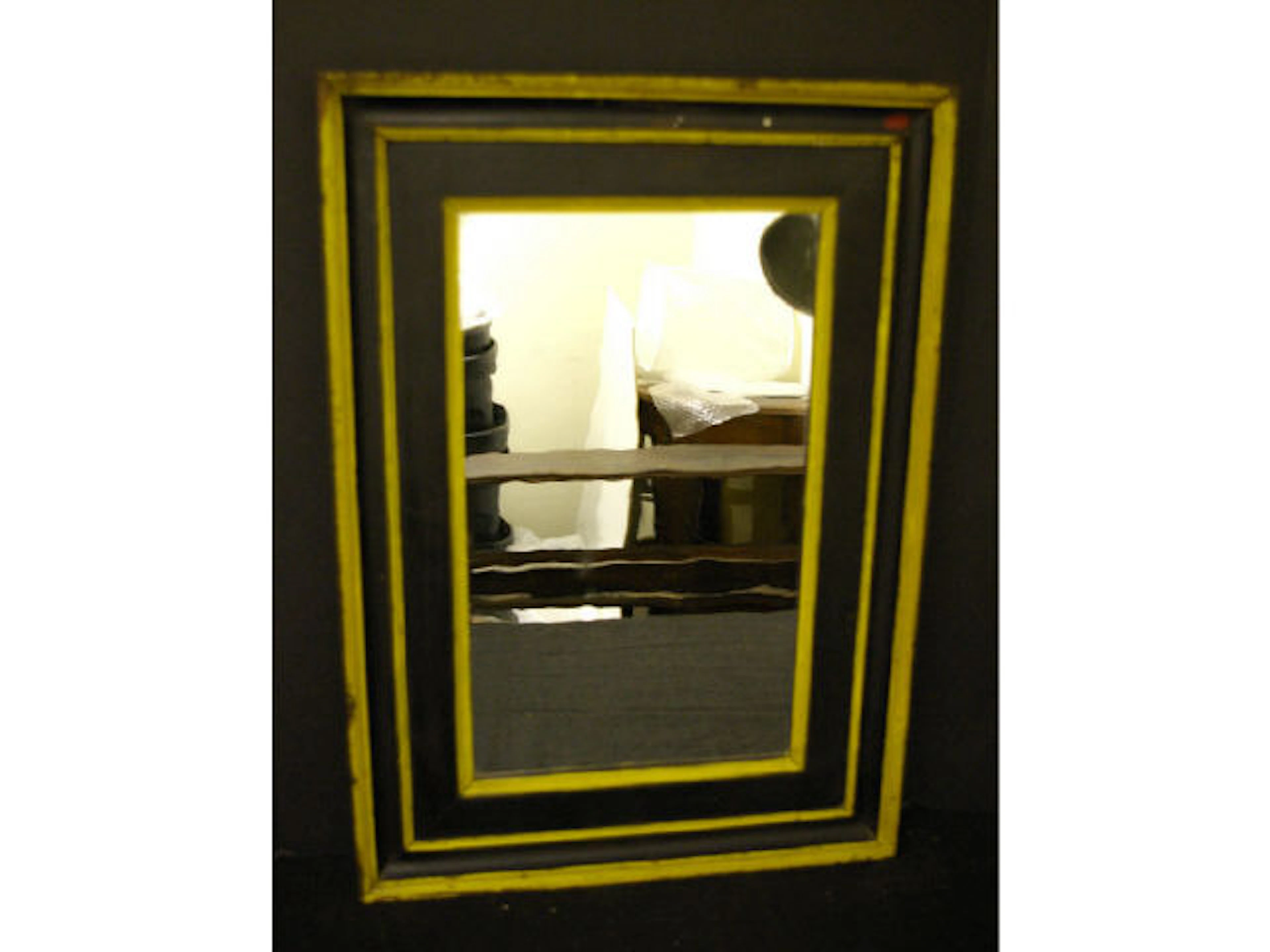 ANTIQUE BLACK AND GOLD PAINTED WALL MIRROR
