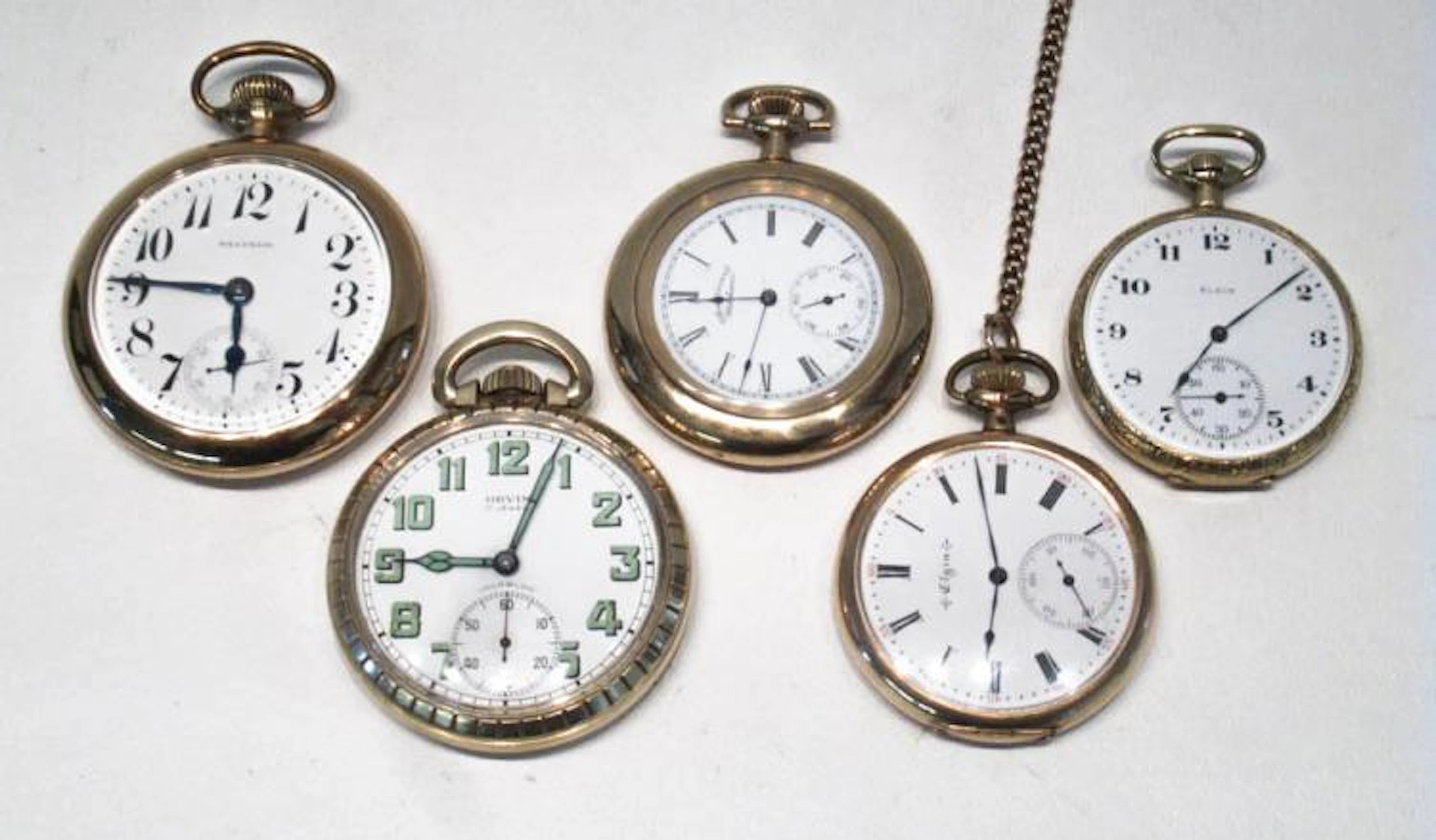 COLLECTION OF FIVE OPEN FACE POCKET WATCHES: Elgi