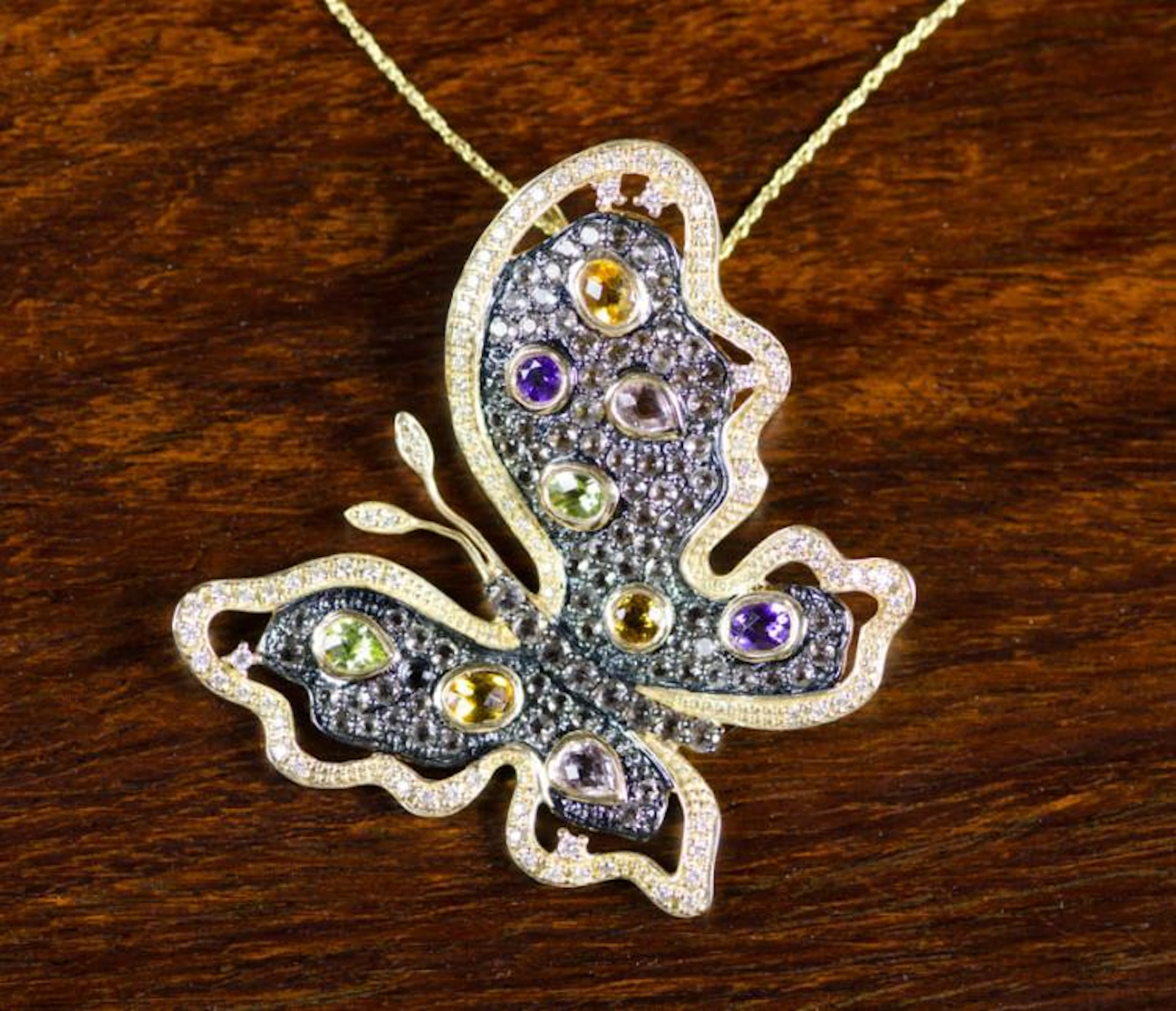 LEVIAN MULTI-STONE PENDANT NECKLACE, suspended on