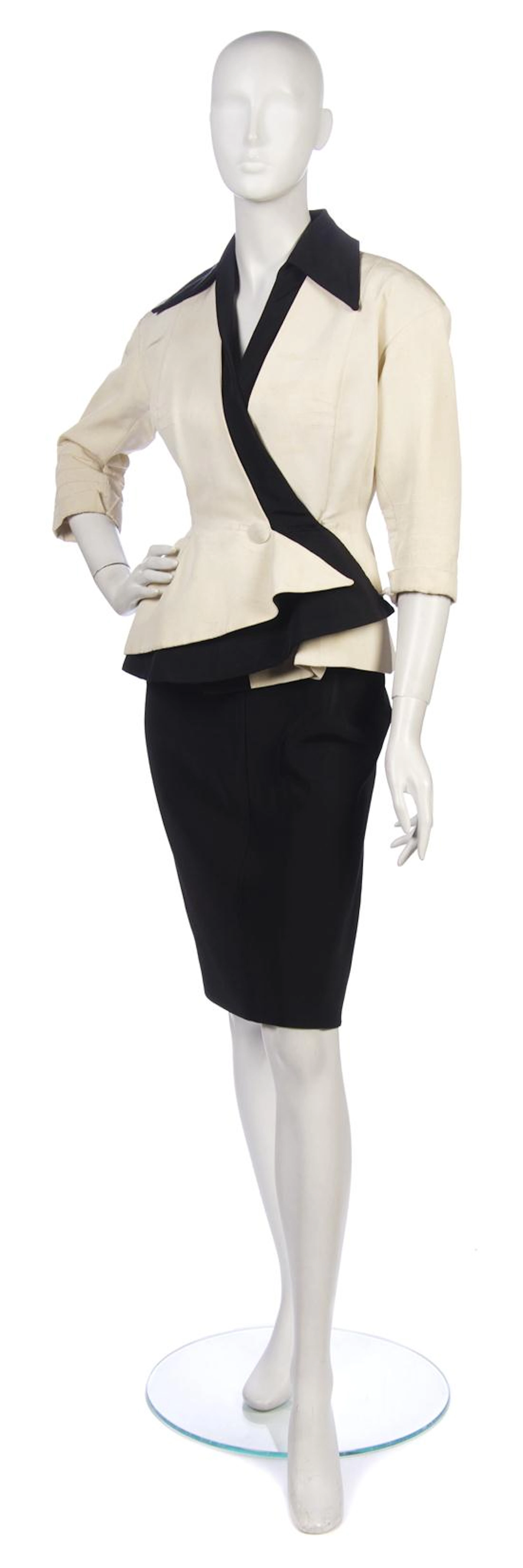 A Jeanne Paquin Cream and Black Corded Silk Skirt Suit, circa 1950,
