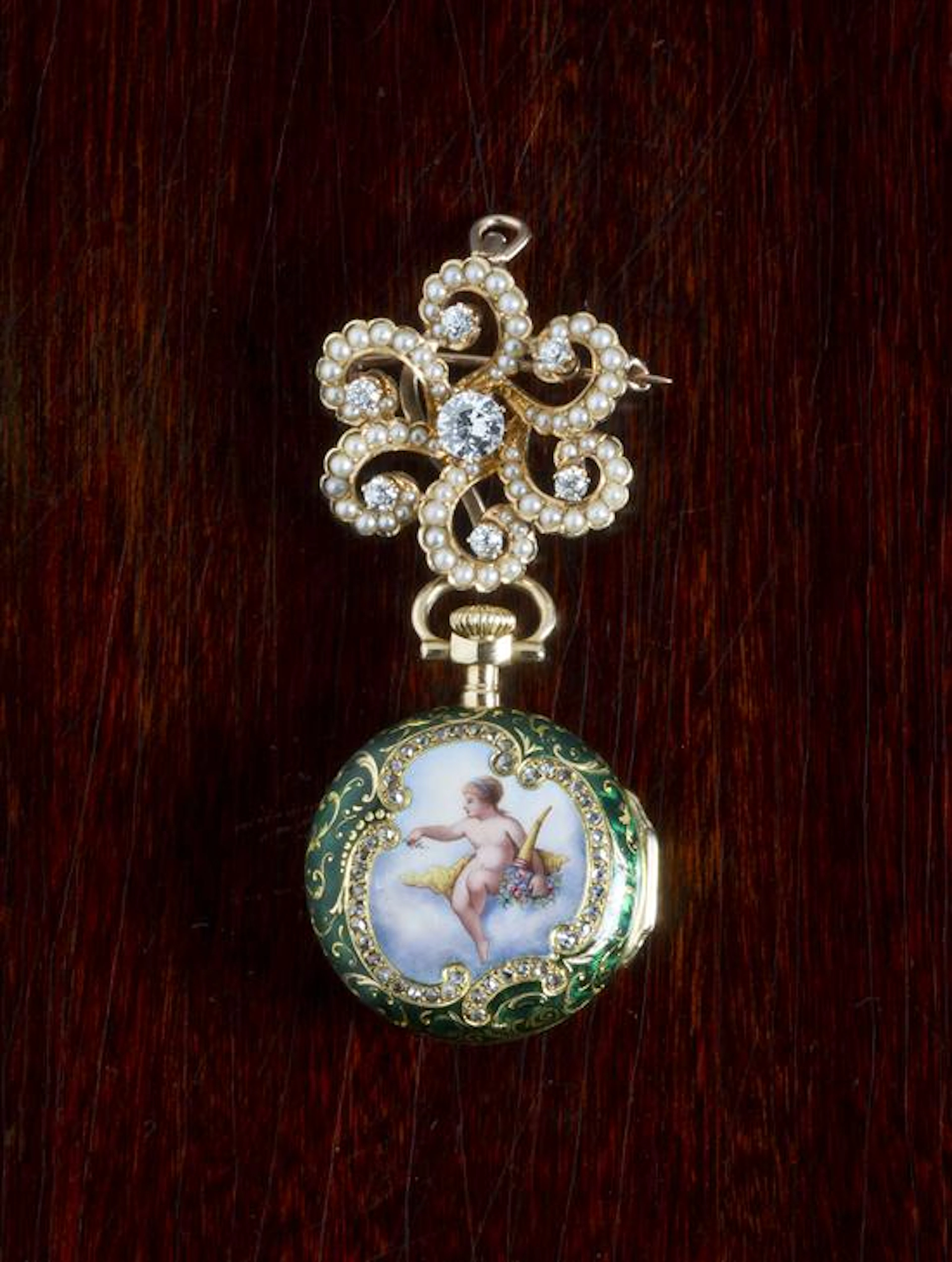 An Important Pair Case 18 Karat Yellow Gold