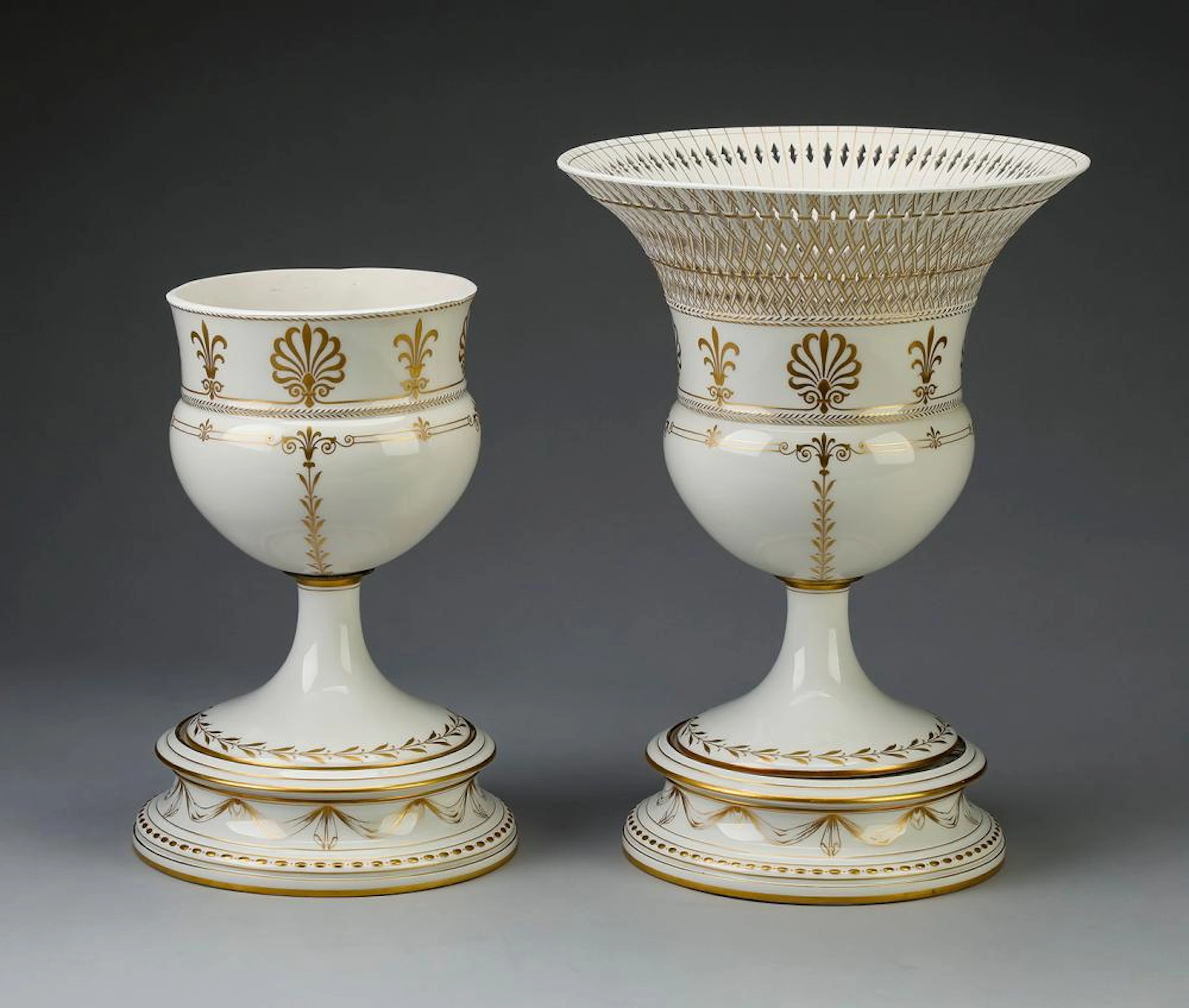 (2) KPM ?Kurland Gold? urns on stands