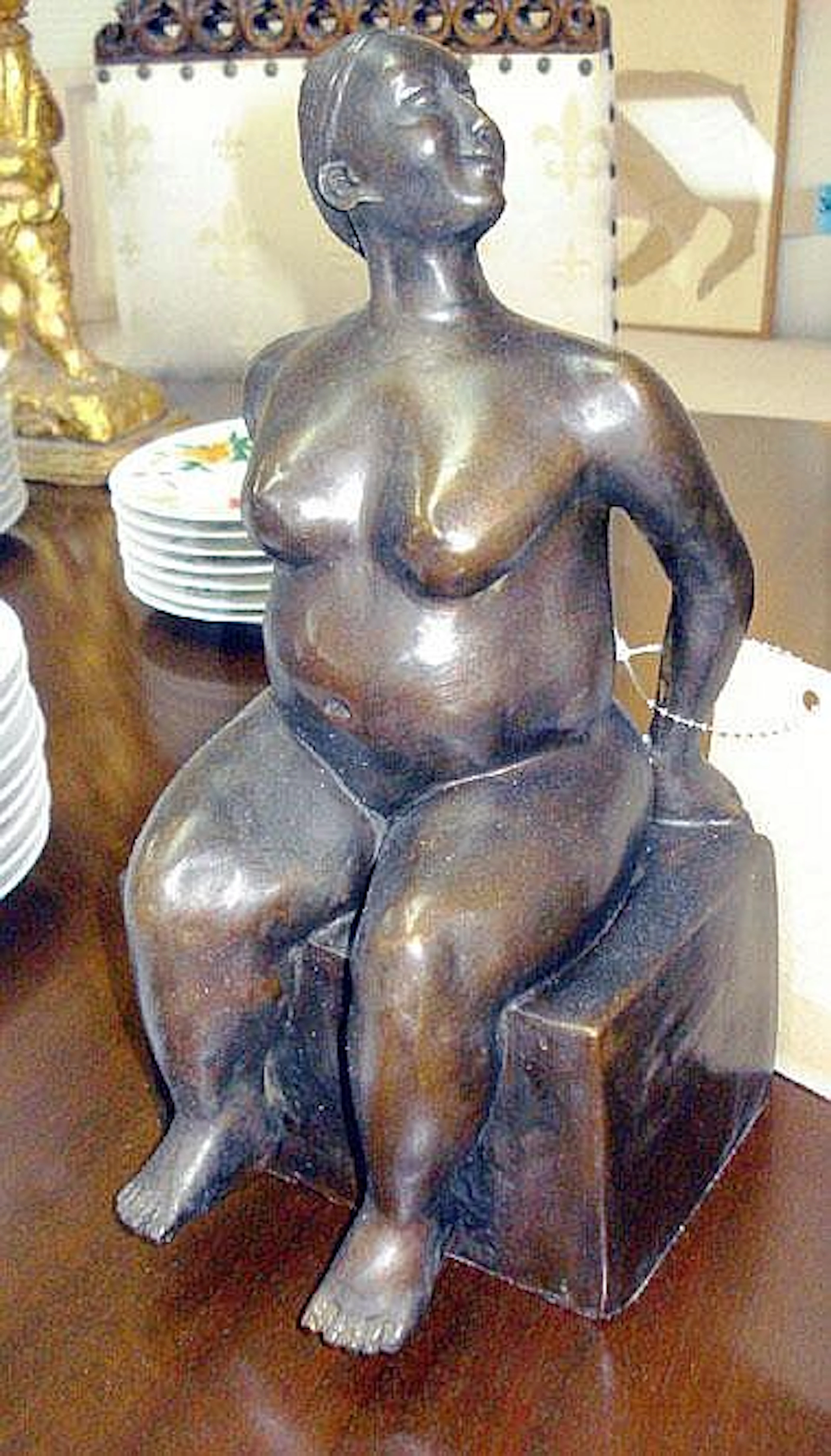 AFTER FERNANDO BOTERO (b.1932), 'Seated Woman',