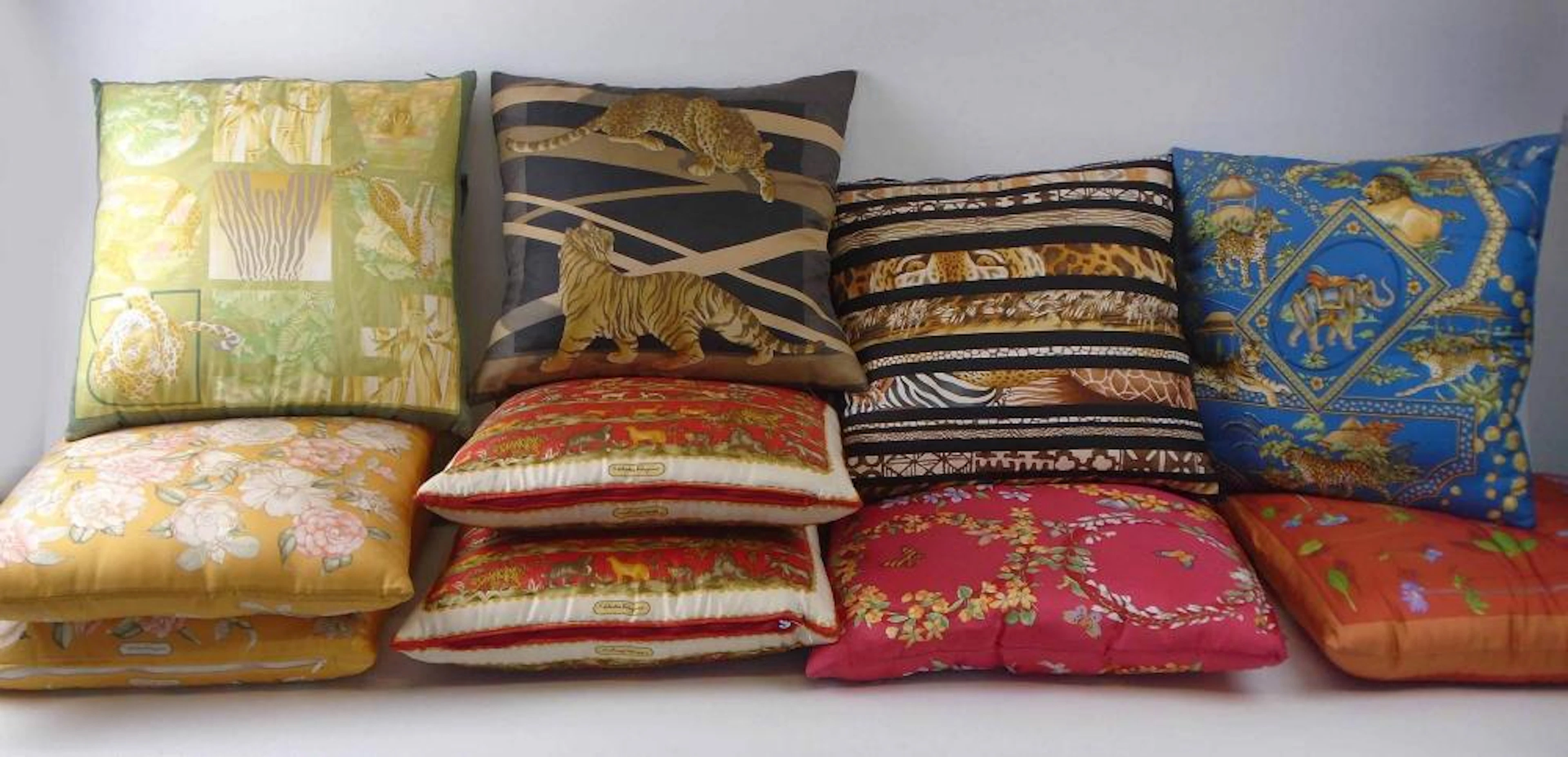 ELEVEN SALVATORE FERRAGAMO SILK CUSHIONS