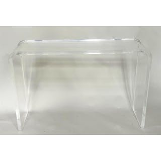 LUCITE CONSOLE TABLE, single piece lucite arched rectangular...