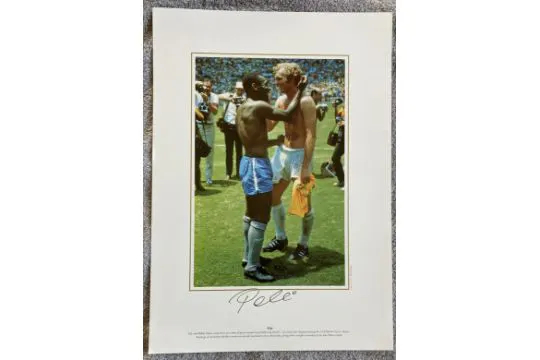 Football legend Pele signed 16 x 12 inch colour photo with Bobby Moore ...