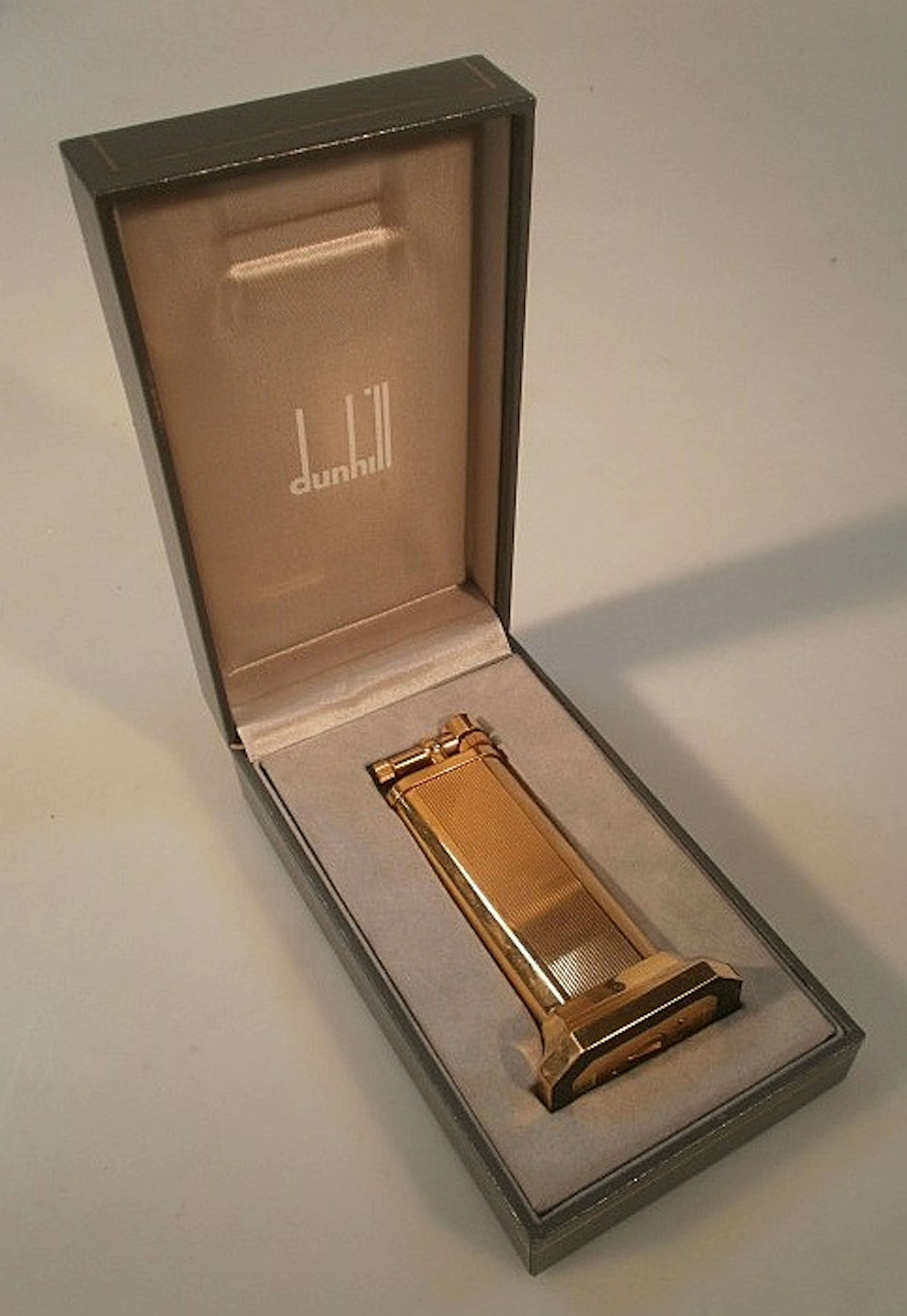A Dunhill Tallboy gold plated table cigarette