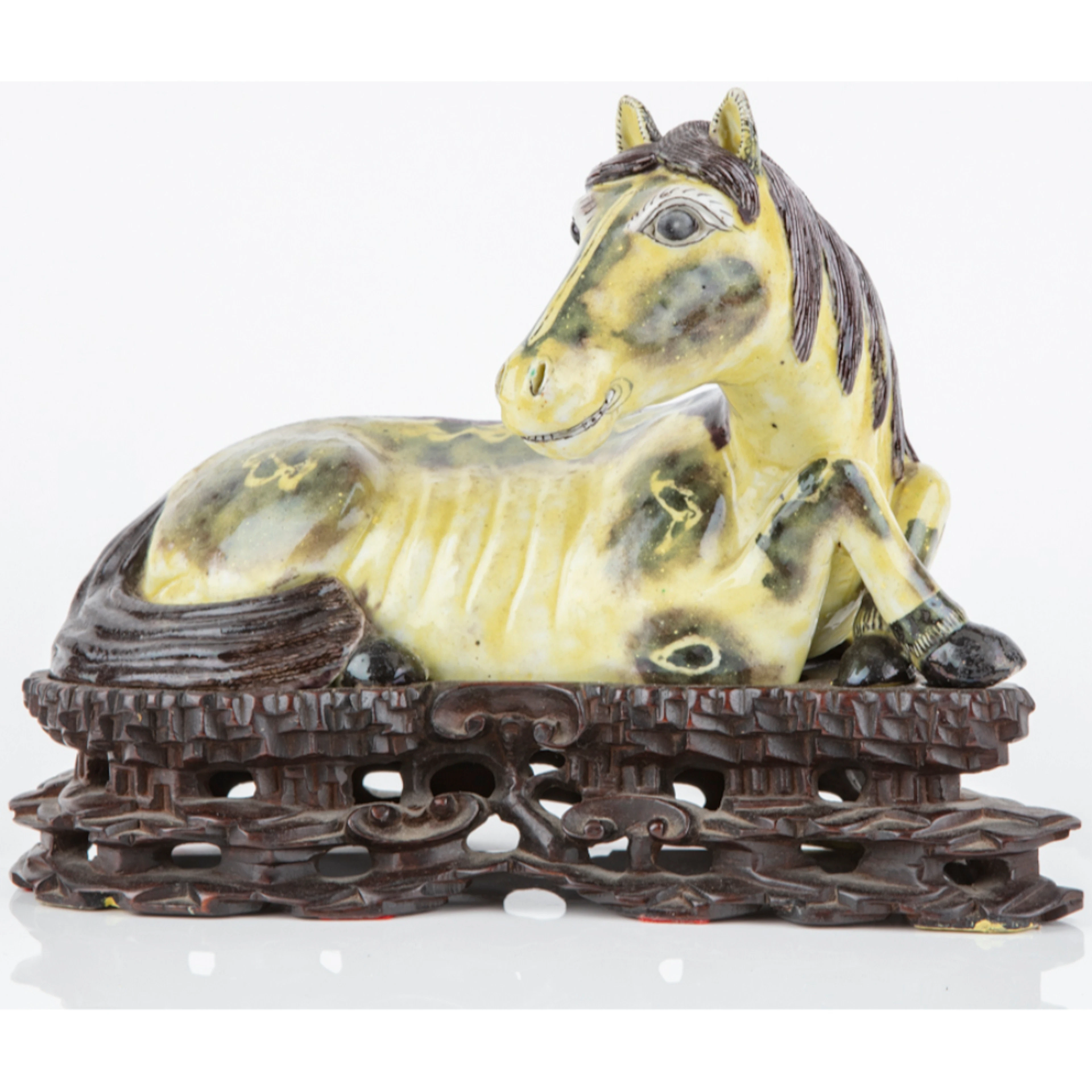 Chinese Sancai Pottery of a Recumbent Horse on Elaborate