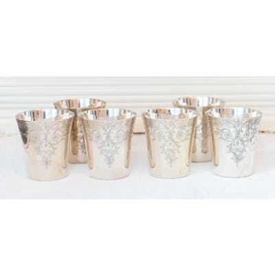A Set of six silver Beakers of straight tapered form with flared rims ...
