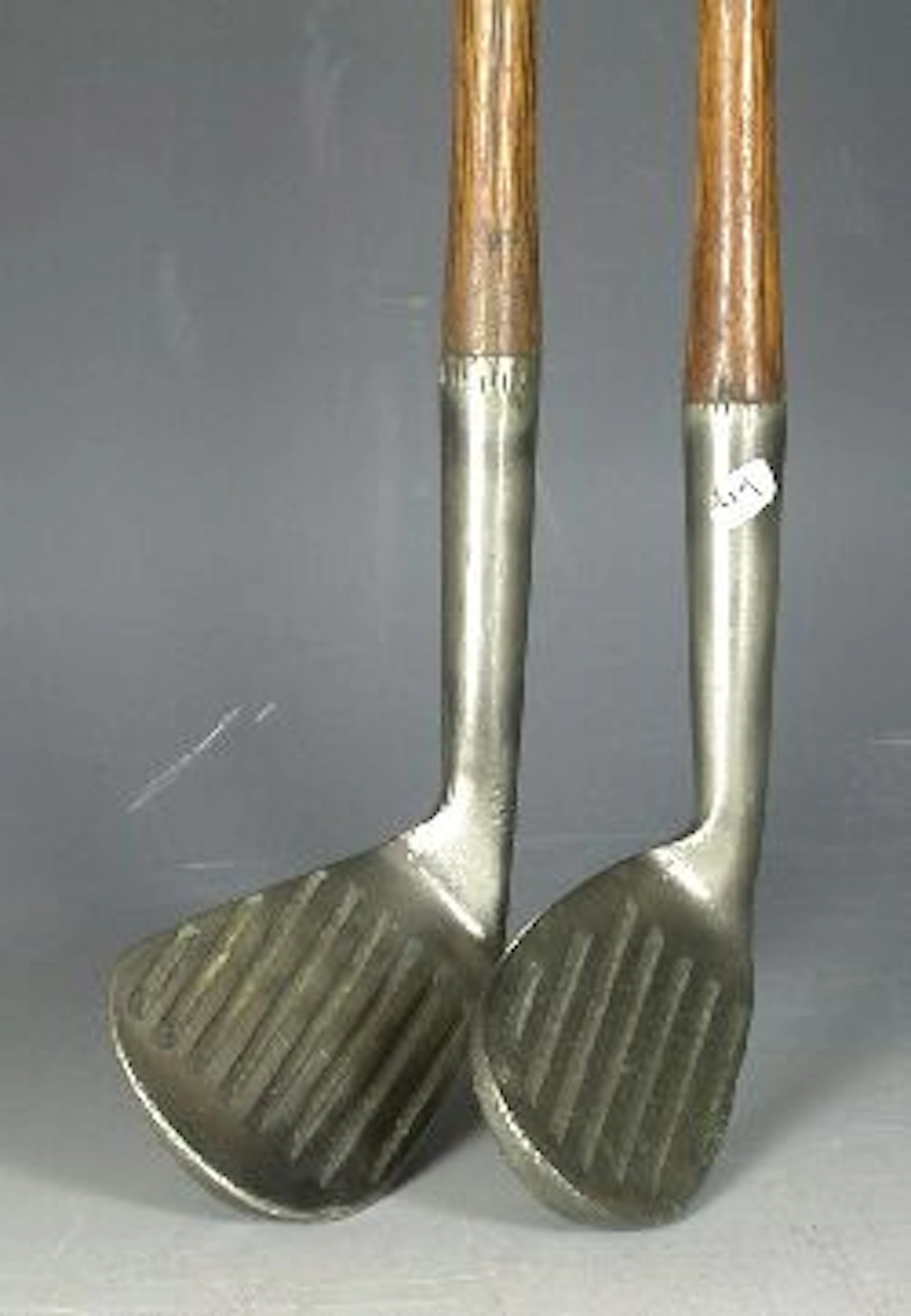 A Jack Hutchison, 'The Hutch Special' spade mashie,, no. H6, with monel metal head, deep grooved face, hickory shaft; and another similar,...