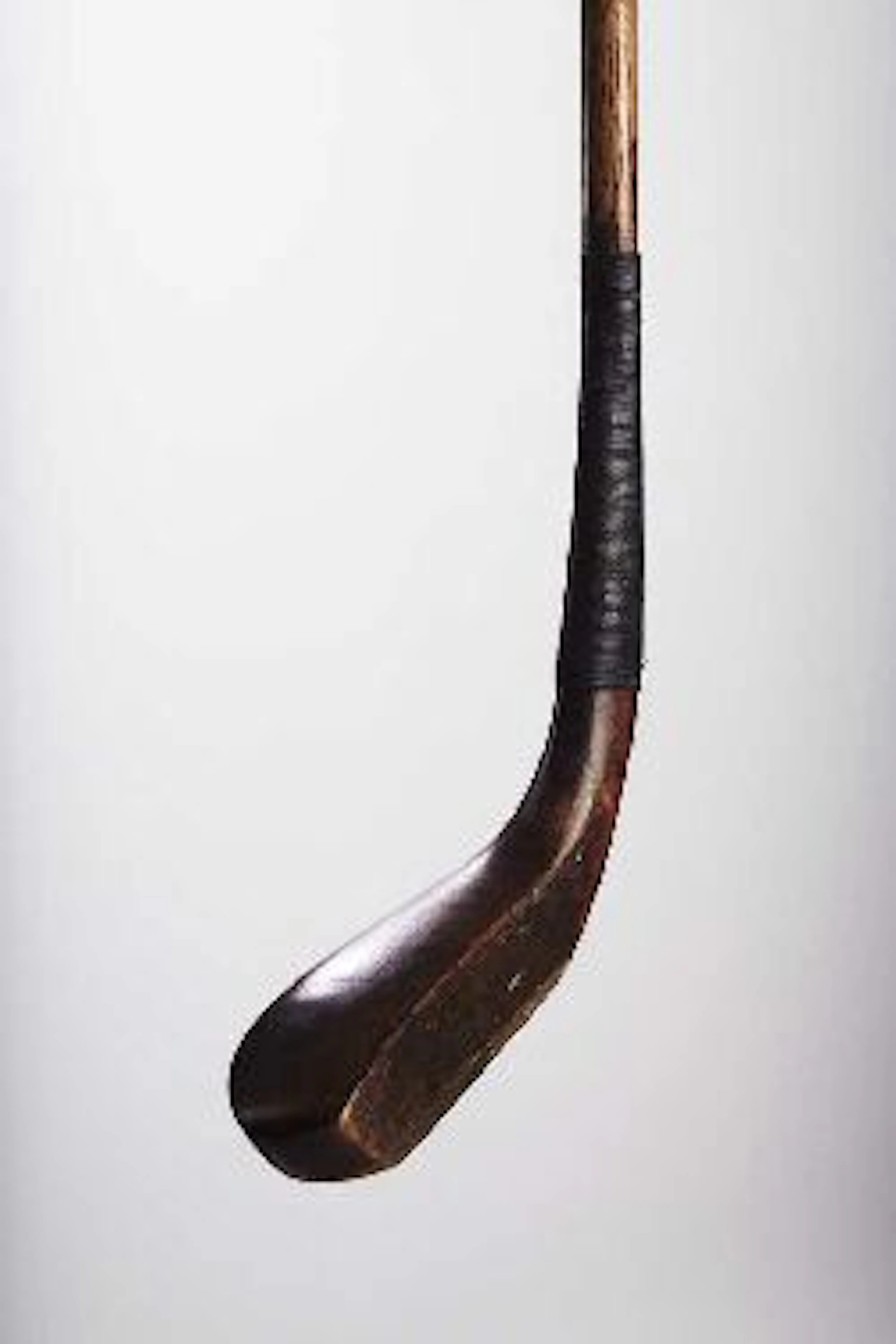 A H. Philp longnose spoon,, the scared head with horn insert to sole, lead counterweight, hickory shaft, wrapped smooth leather grip