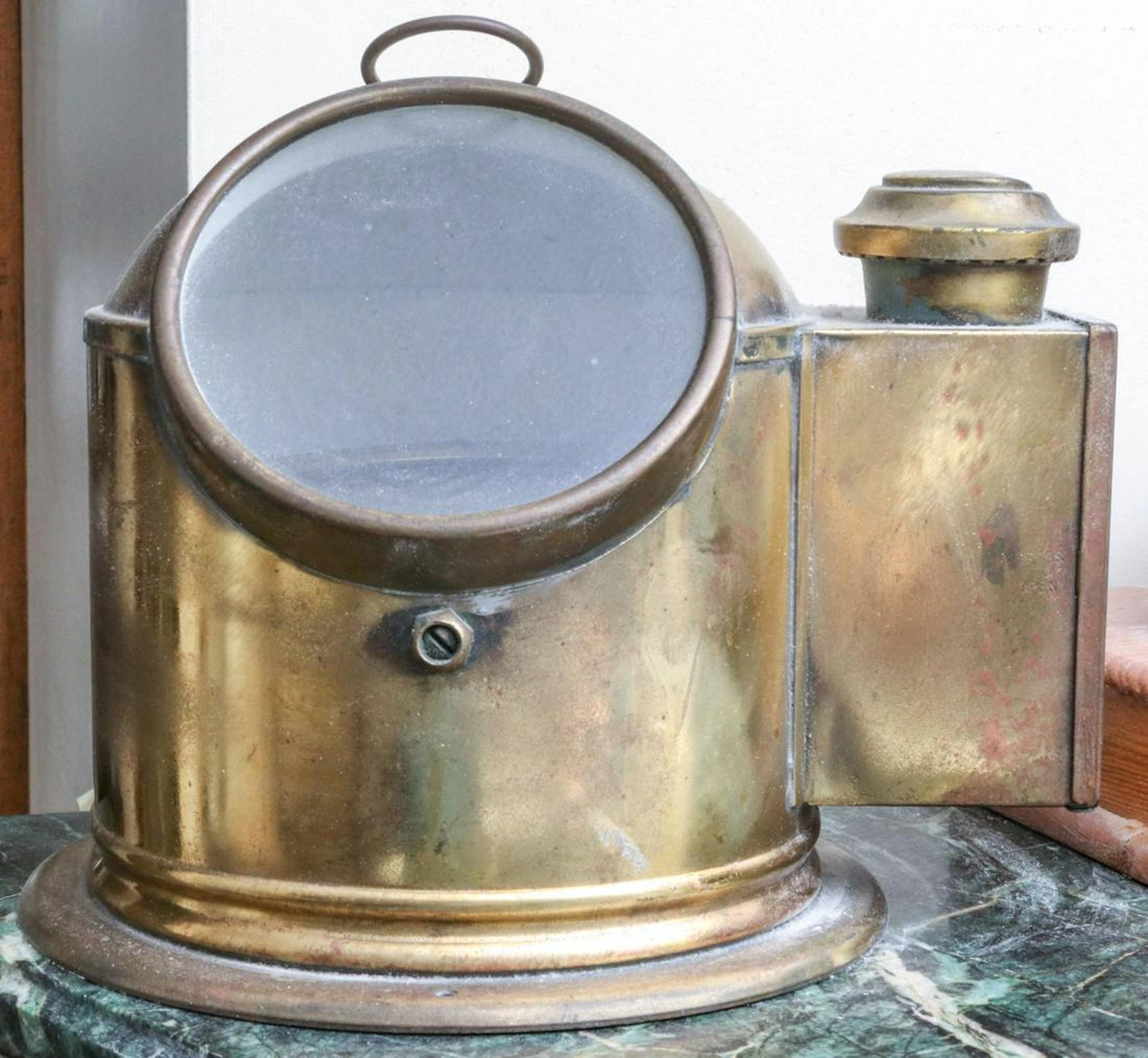 AN ANTIQUE BRASS SHIP'S BINNACLE PLUS WALL BAROMETER