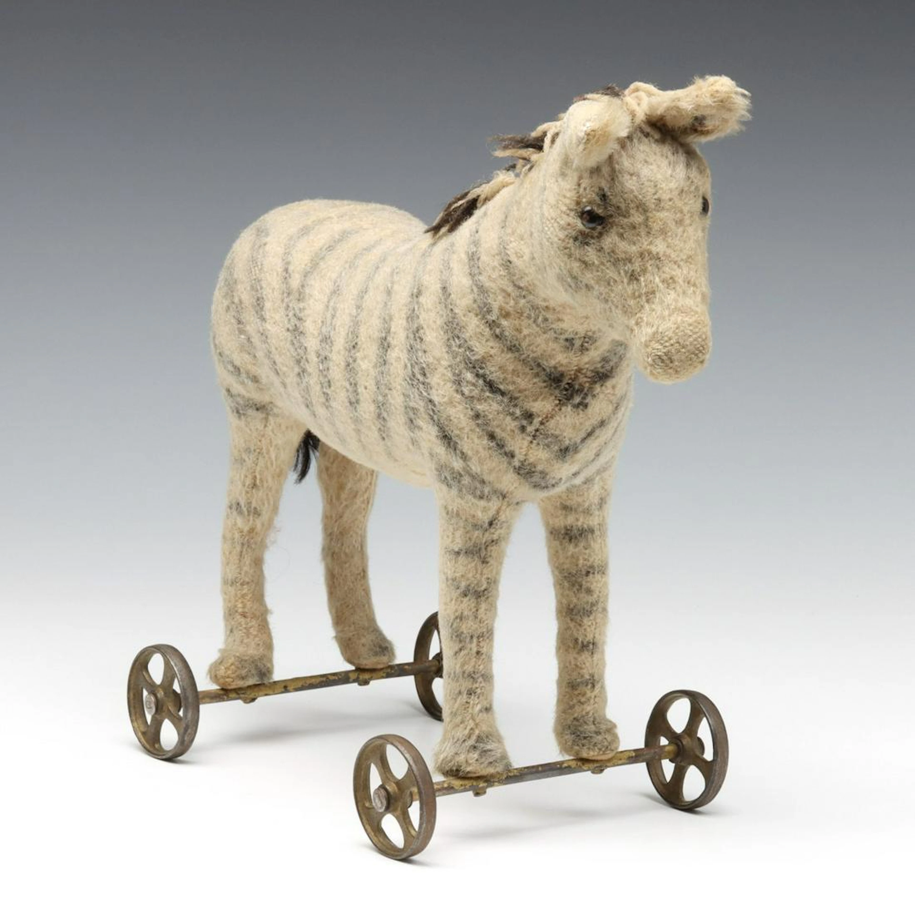A RARE AND DESIRABLE STEIFF ZEBRA ON WHEELS CIRCA 1915