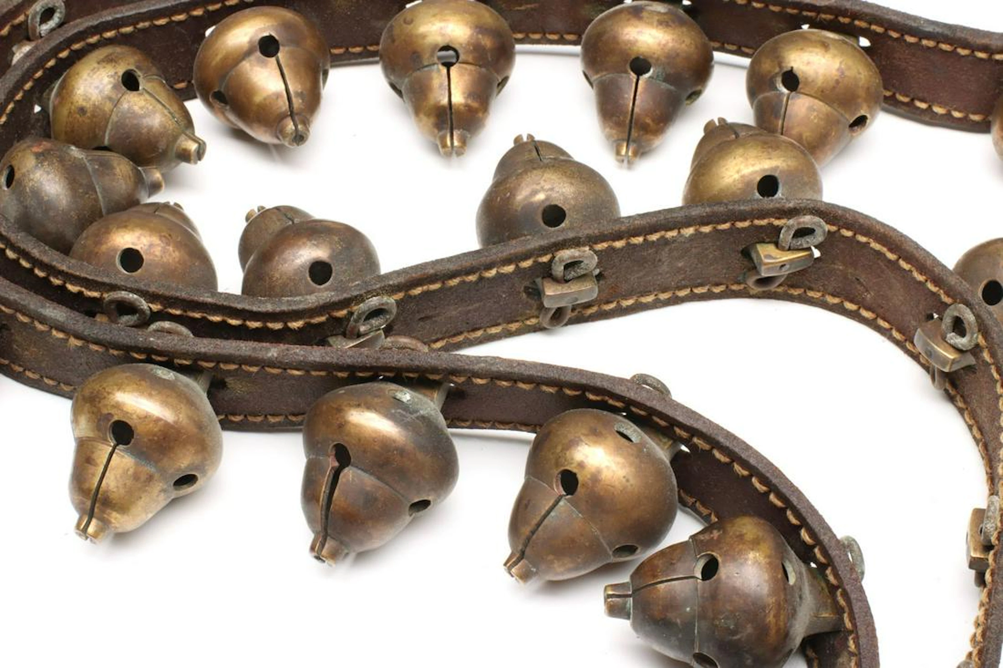 LEATHER STRAP WITH 31 UNUSUAL ACORN-FORM BRASS BELLS