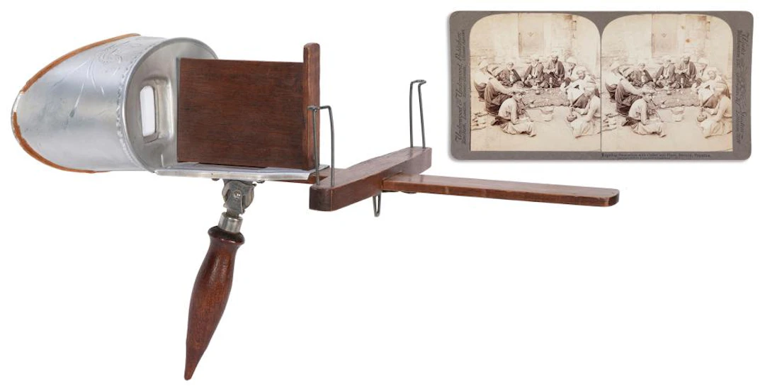 [STEREOVIEWS]. PAIR OF STEREOVIEWERS WITH A LARGE GROUP OF ...
