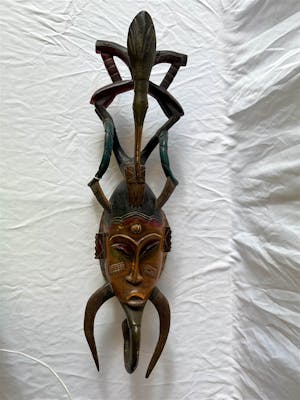 African hand carved Guro mask | Barnebys