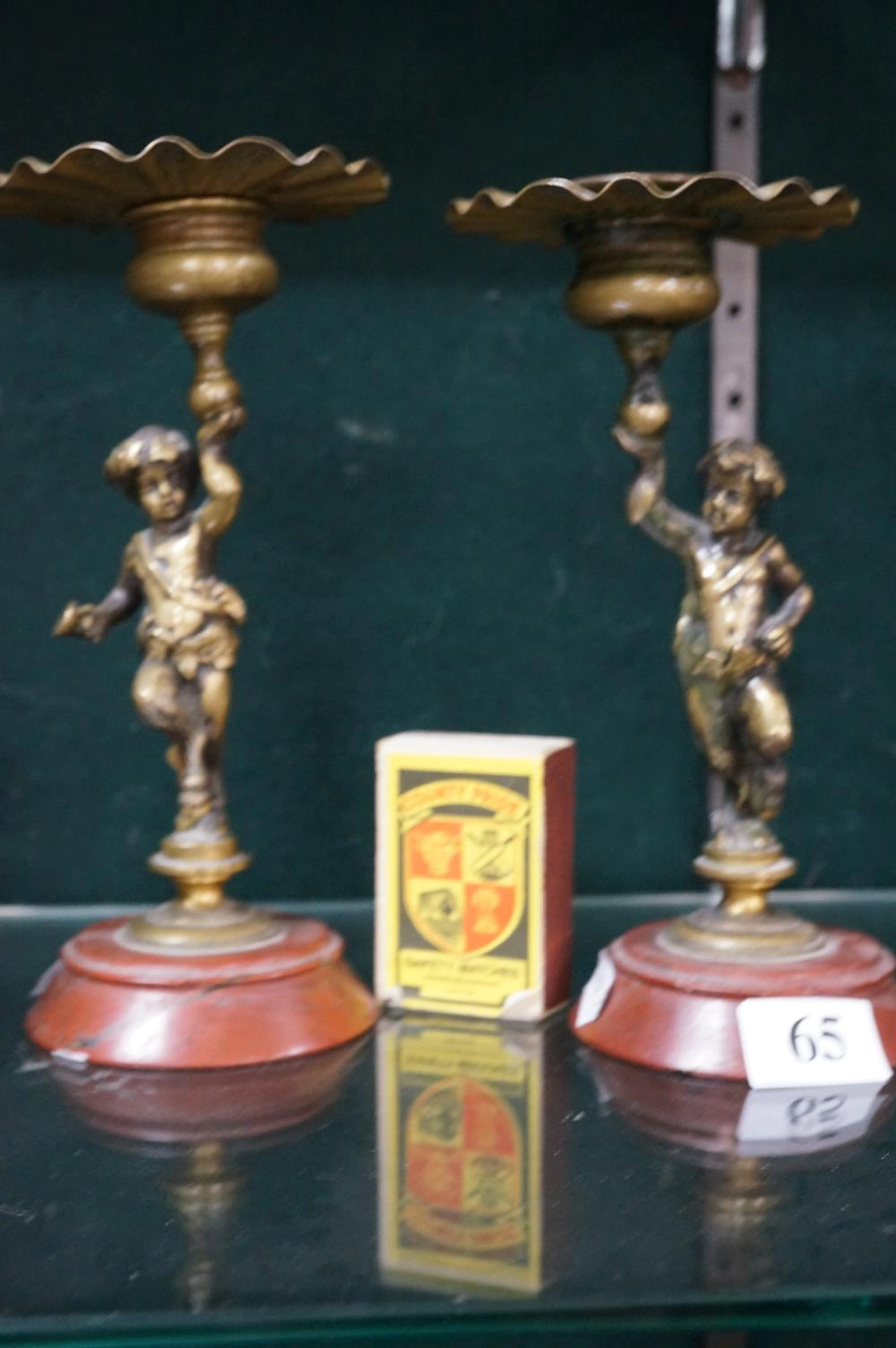 PR C19TH BRASS FIGURED CANDELSTICKS ON MARBLE BASES, 17 CM HIGH