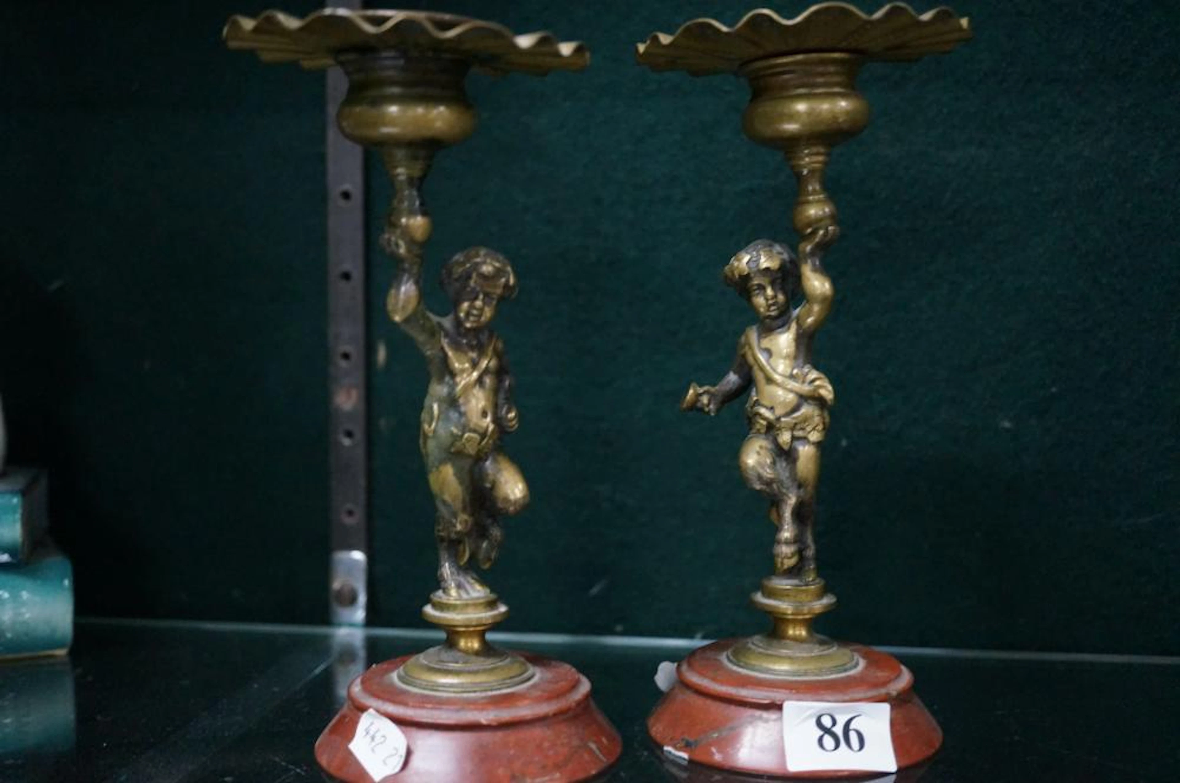 PR C19TH BRASS FIGURED CANDELSTICKS ON MARBLE BASES, 17 CM HIGH