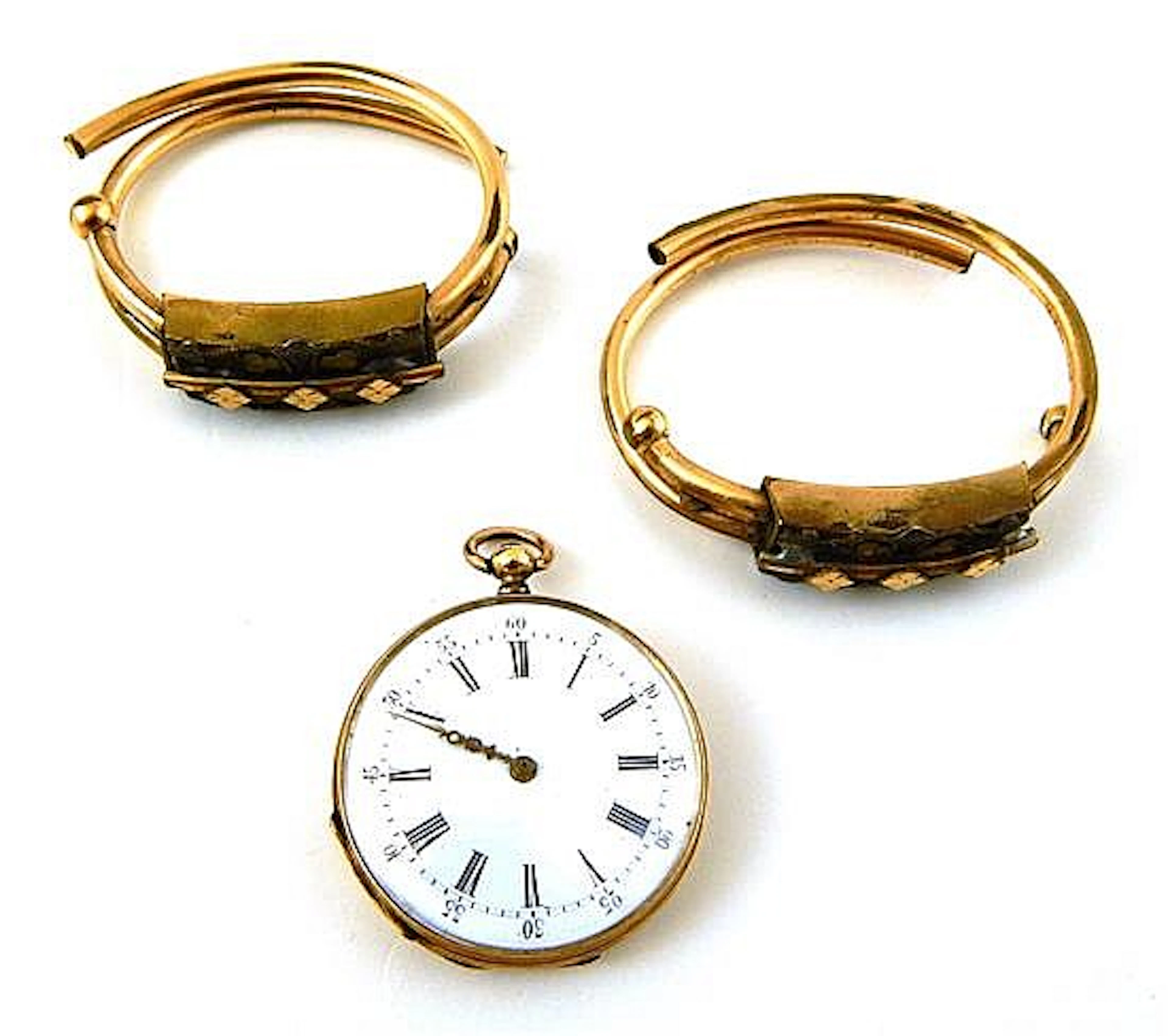 JEWELRY: Three gold-filled pieces including a pocket...