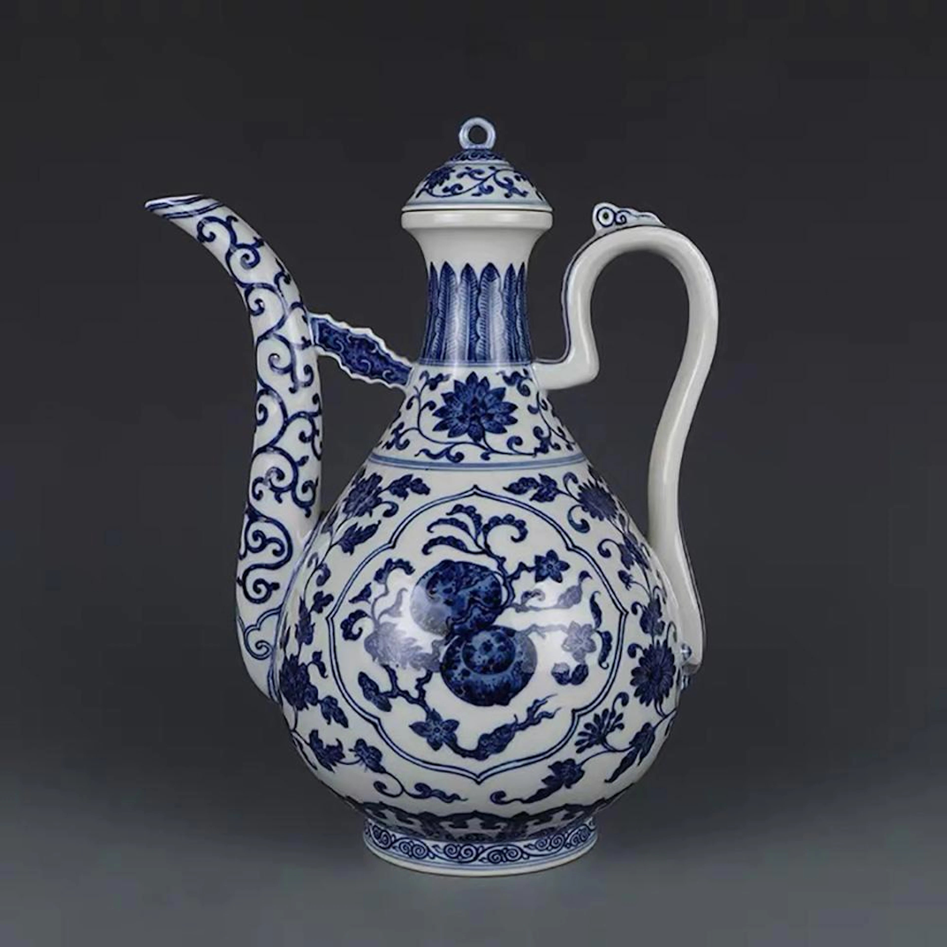 A CHINESE BLUE AND WHITE PAINTED PORCELAIN EWER