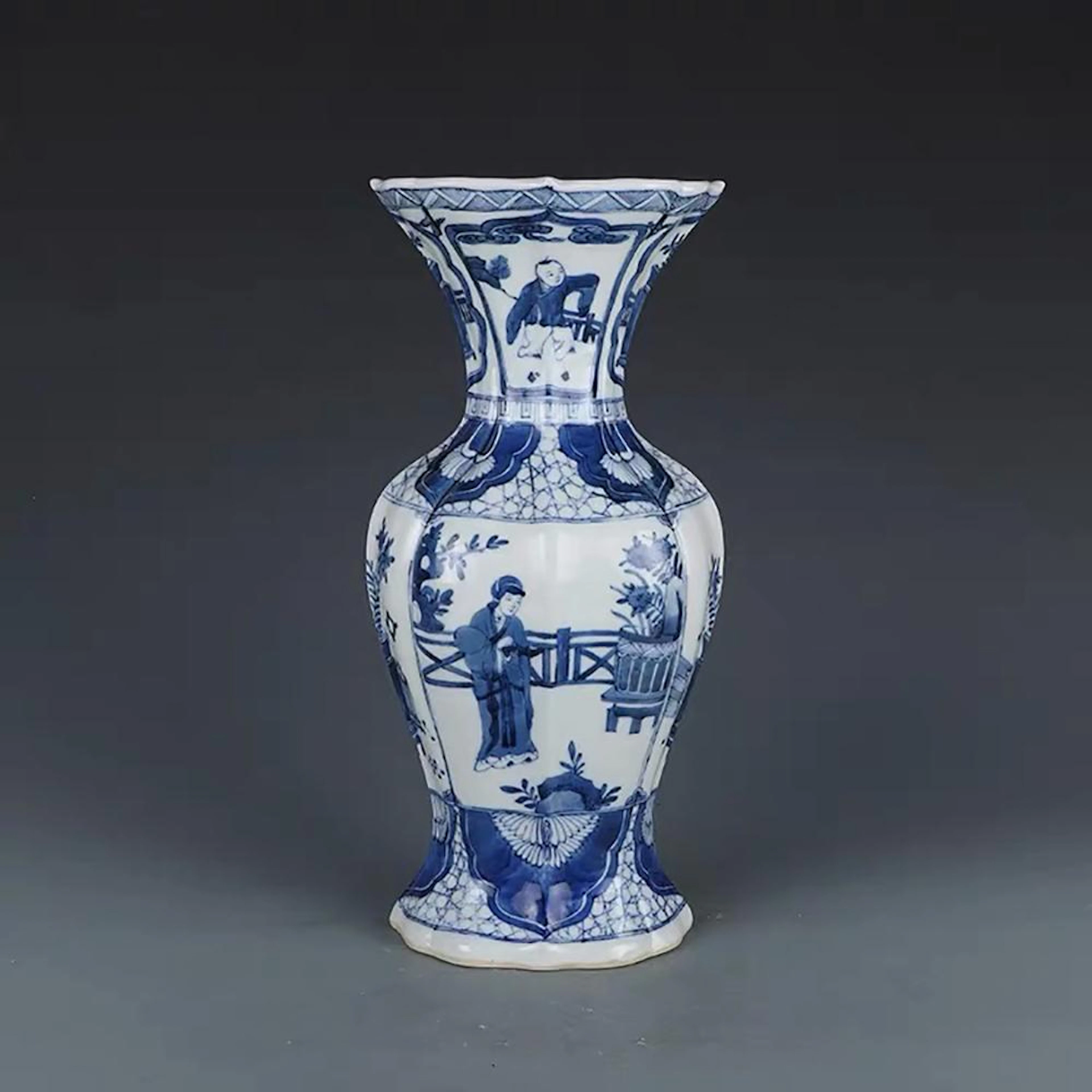 A CHINESE BLUE AND WHITE FIGURE PAINTED PORCELAIN FLOWER VASE