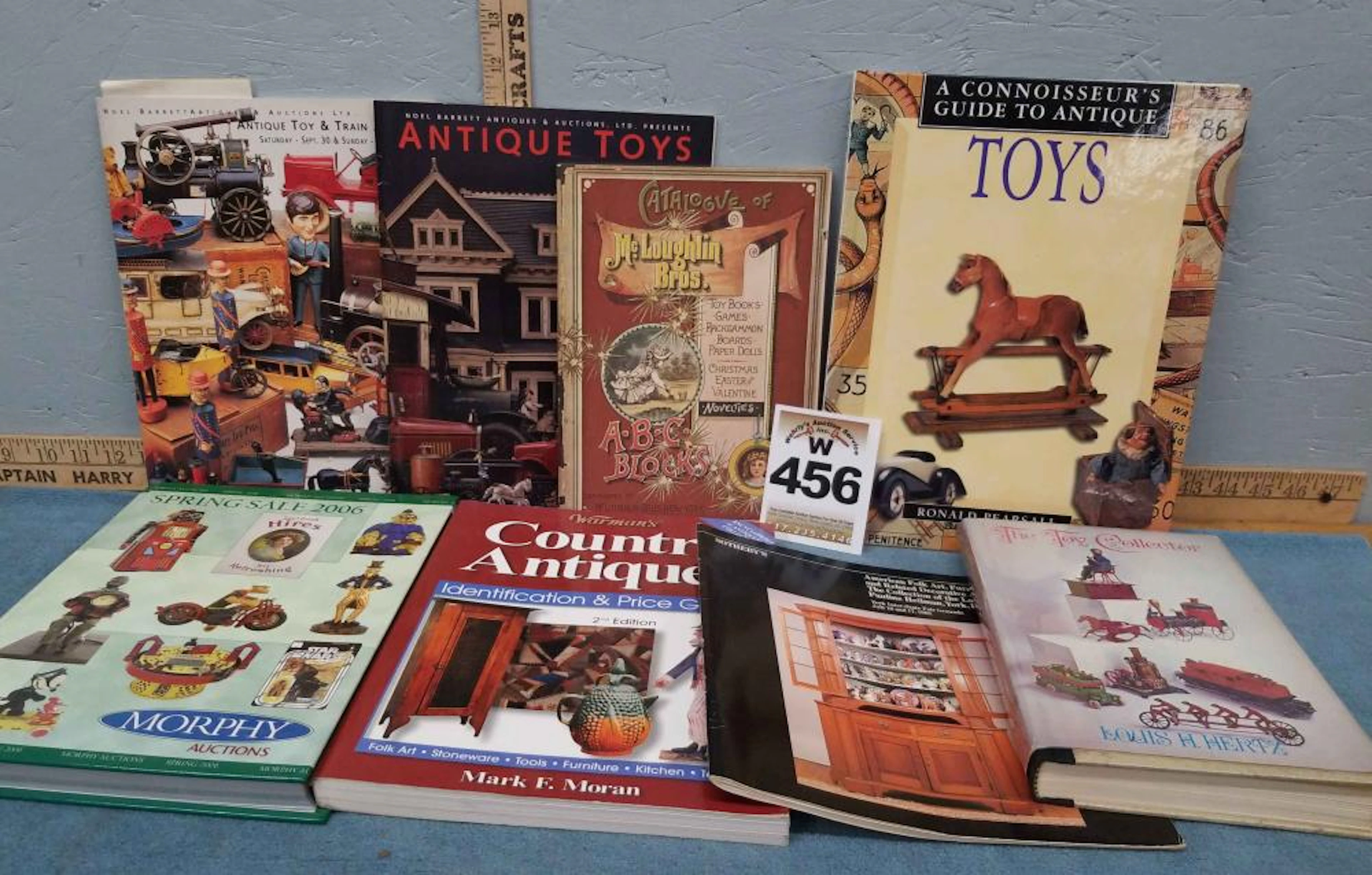 8 Antique Toy books