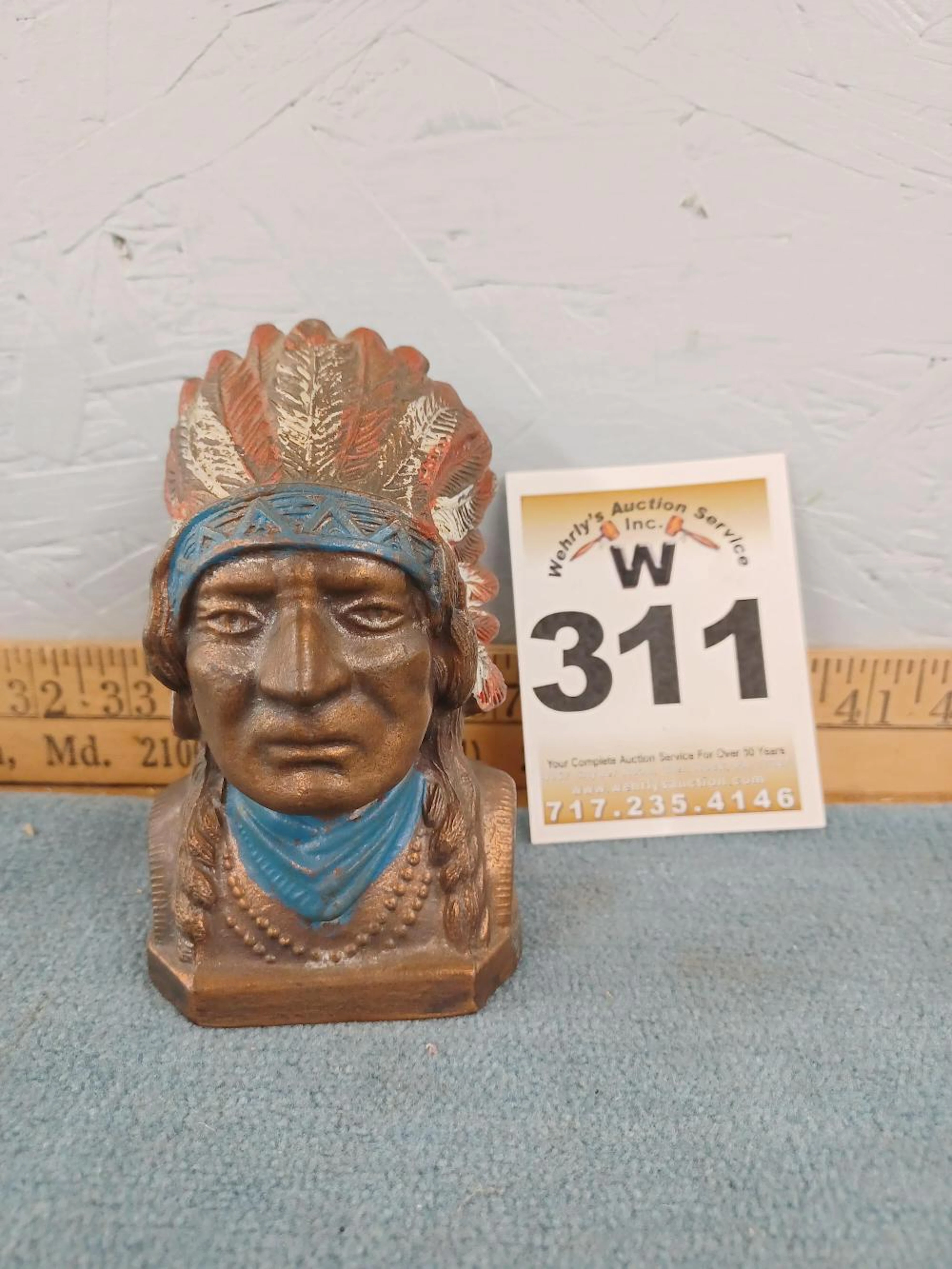 White metal Native American bank w/ coins