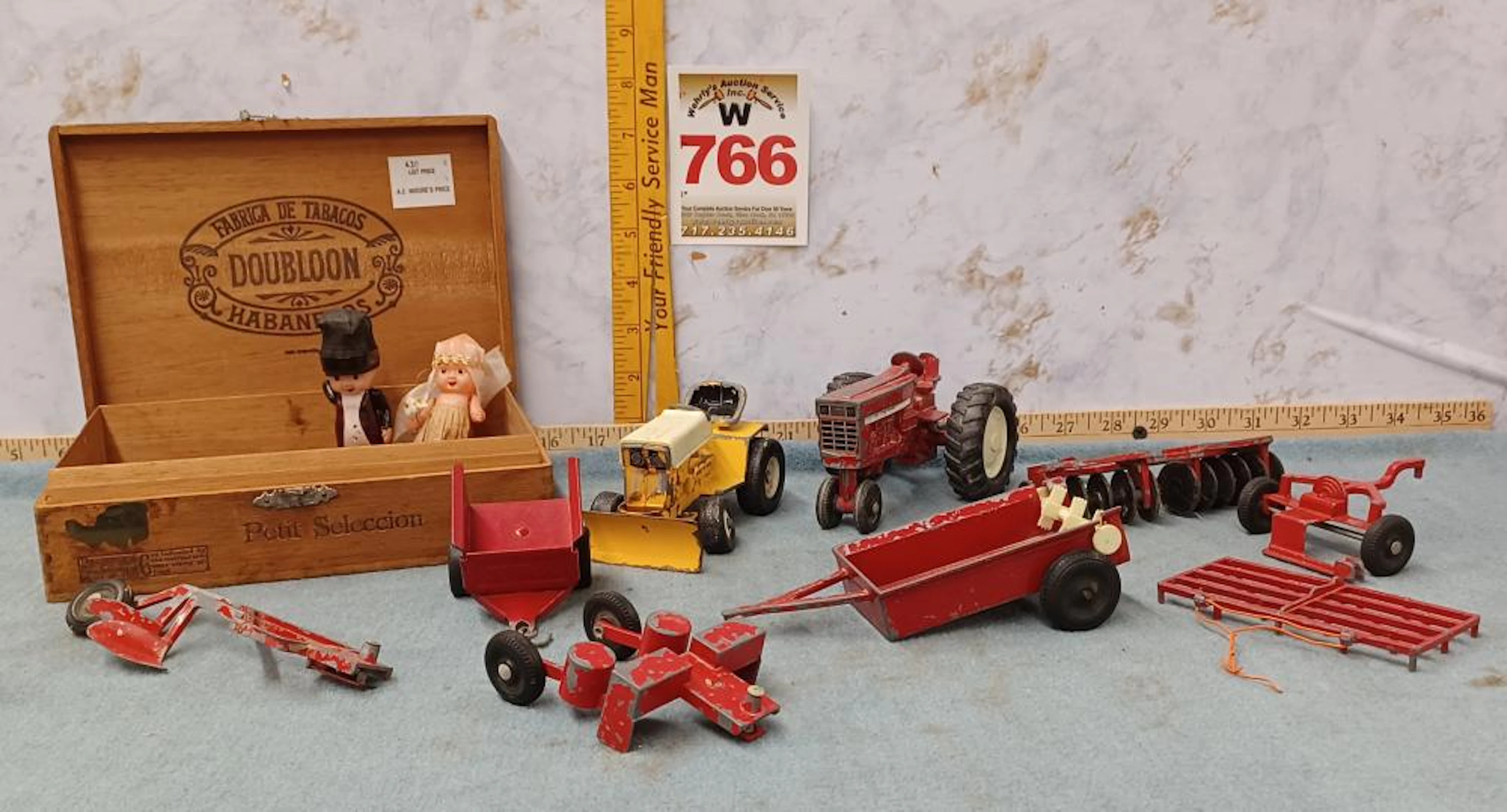 Toy tractors/Doubloon cigar box