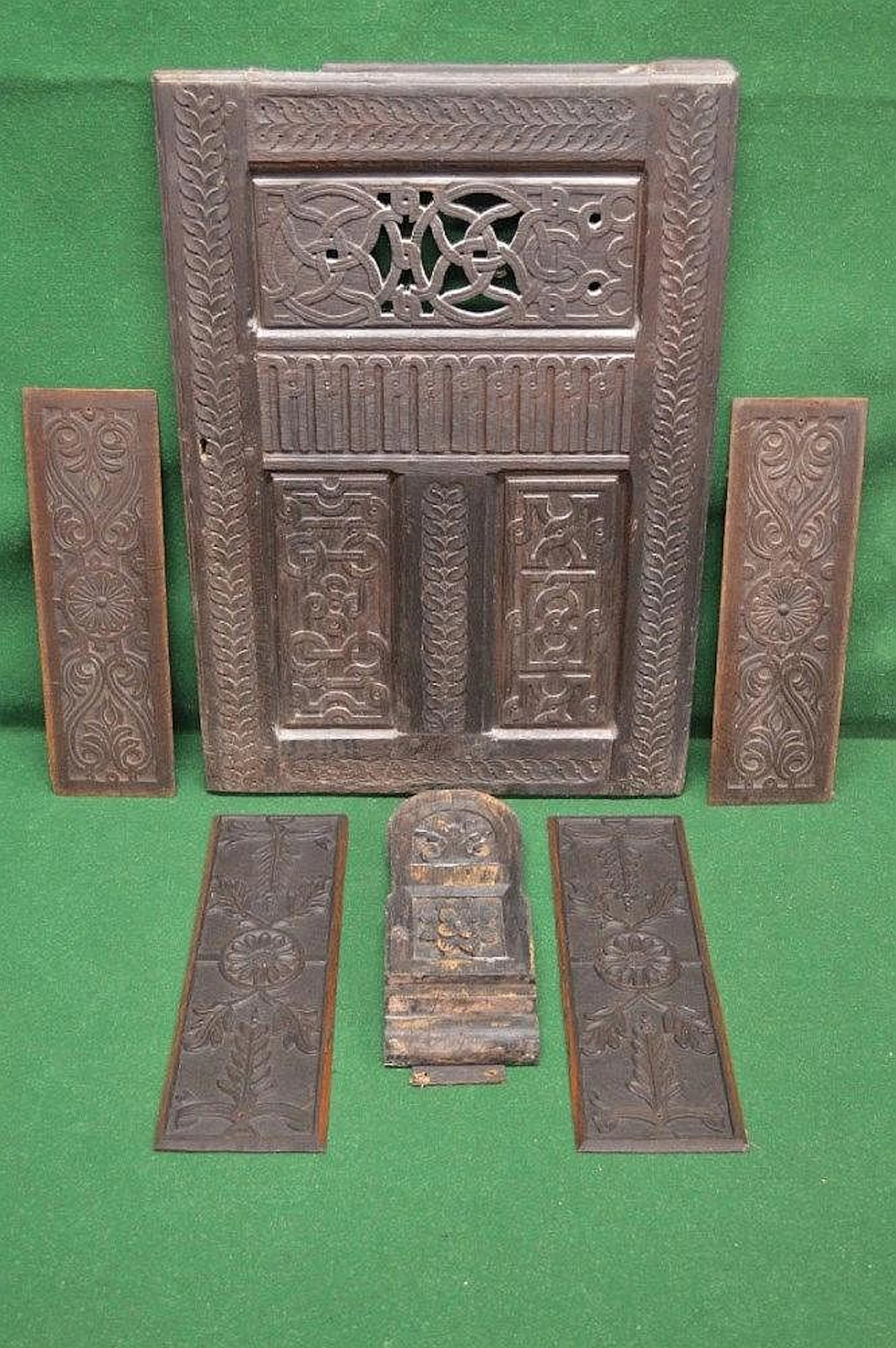 Group of oak carved panels together with oak carved corbel