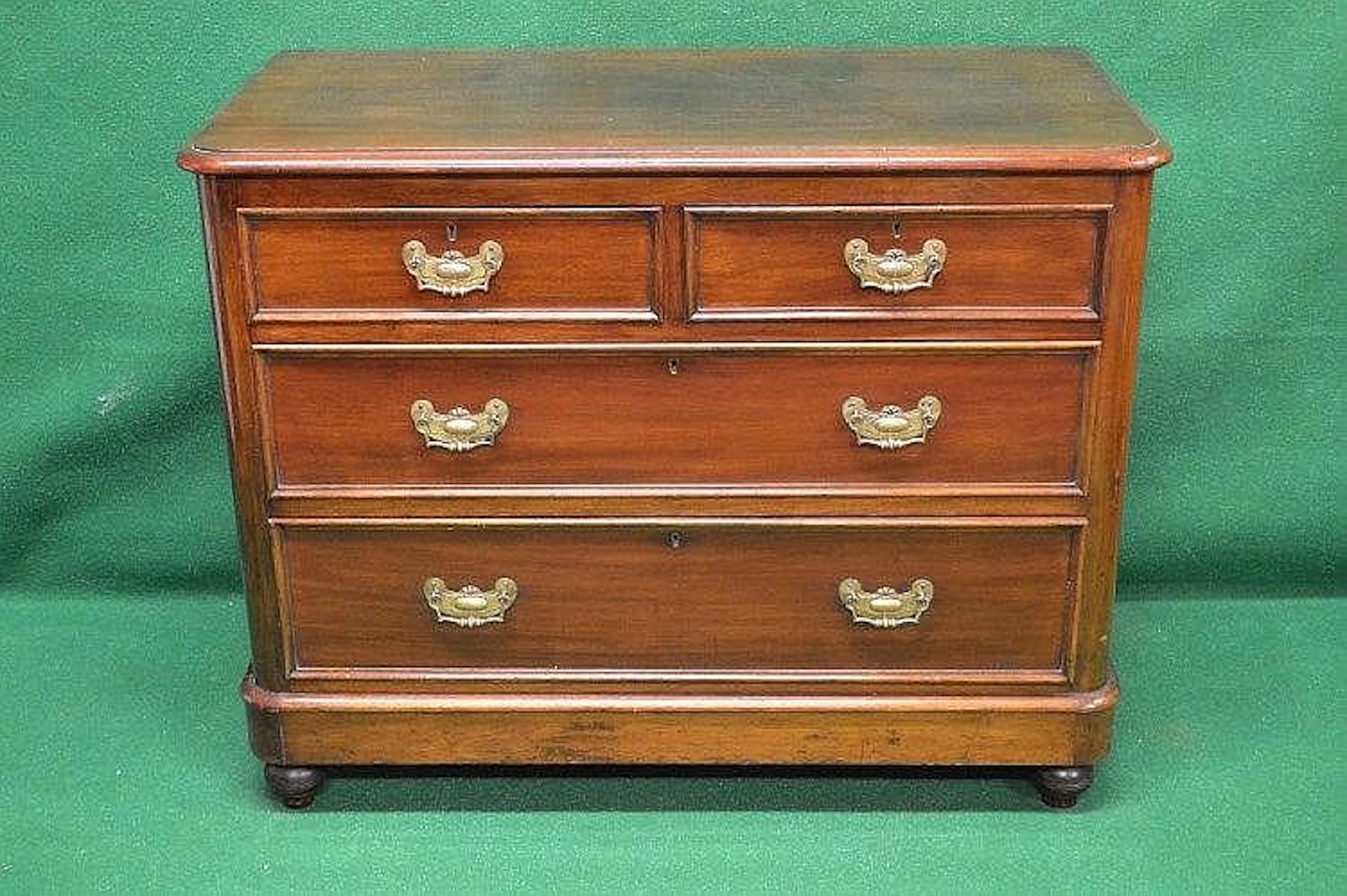 Victorian mahogany chest of four drawers having two short...