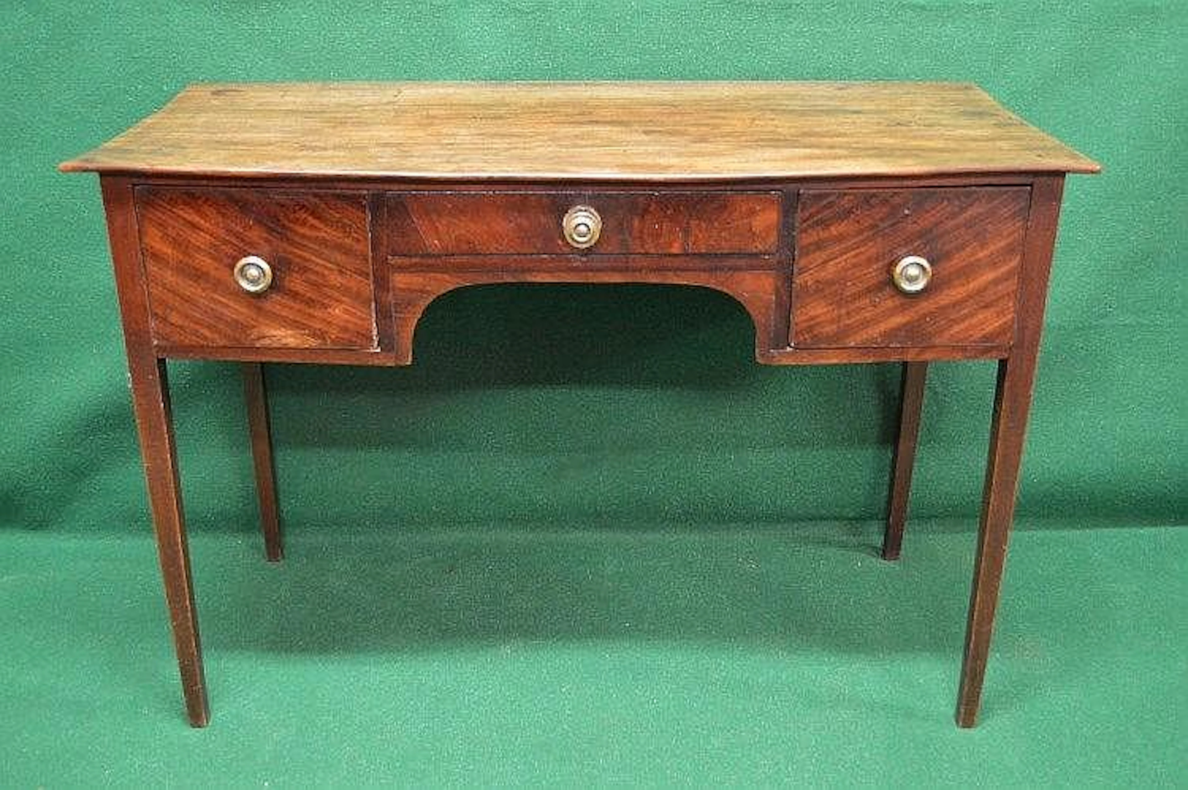 Mahogany three drawer serving table having single shallow...