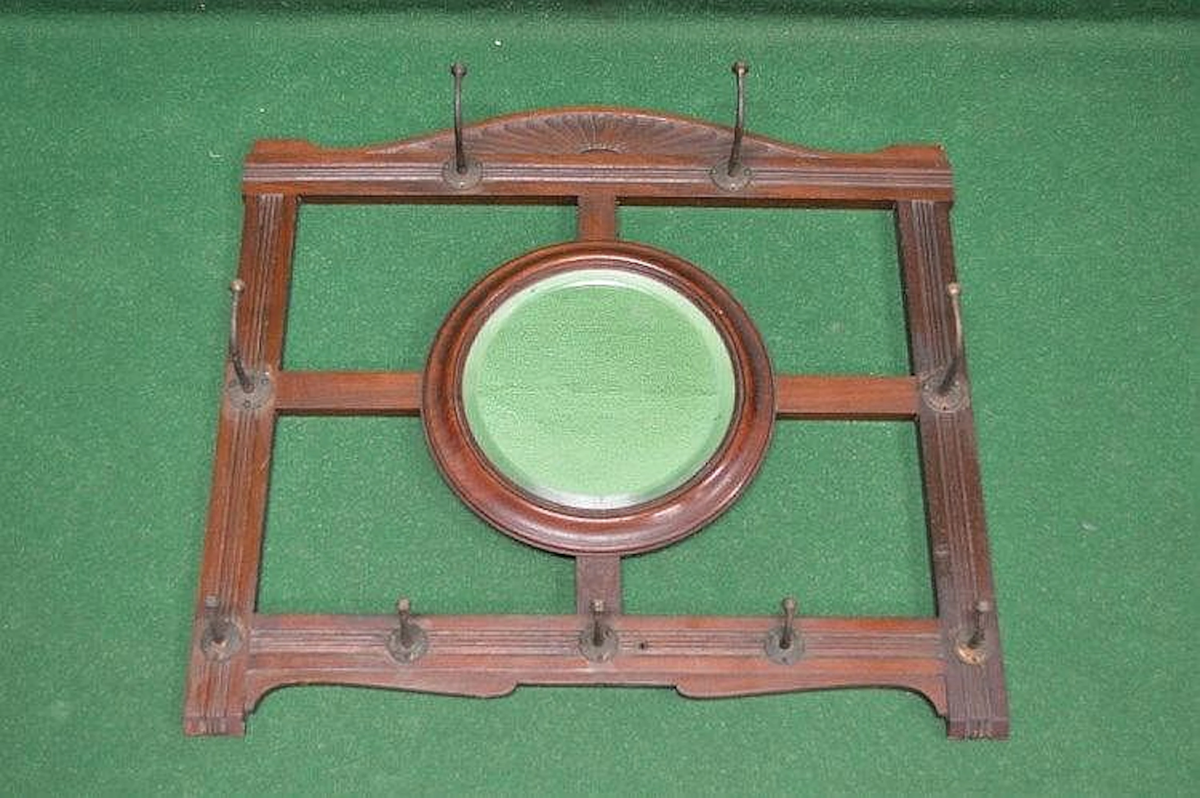 Walnut framed hall mirror with brass coat hooks - 27.5'' wide