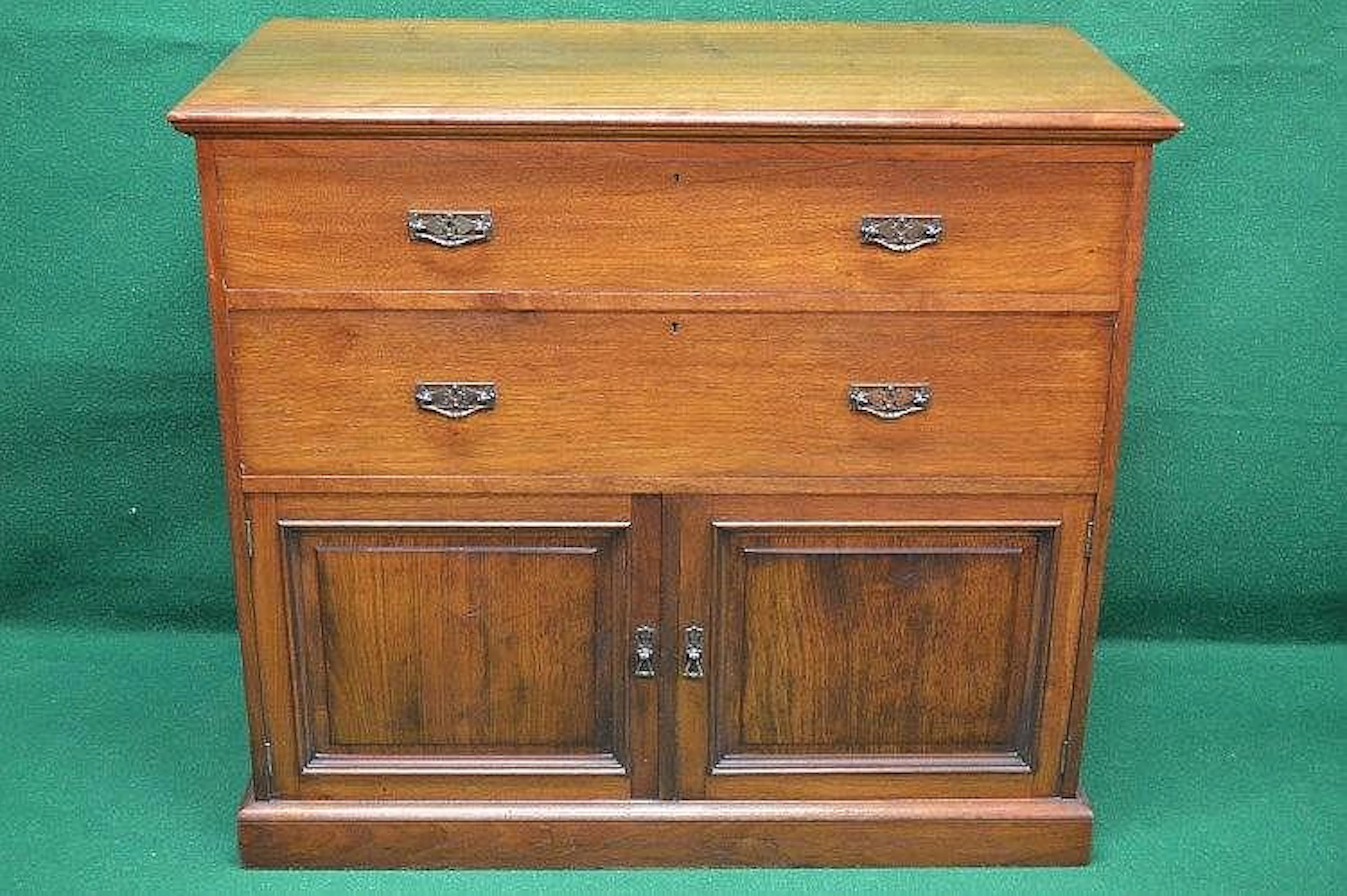 Walnut linen cupboard having two long drawers over two...