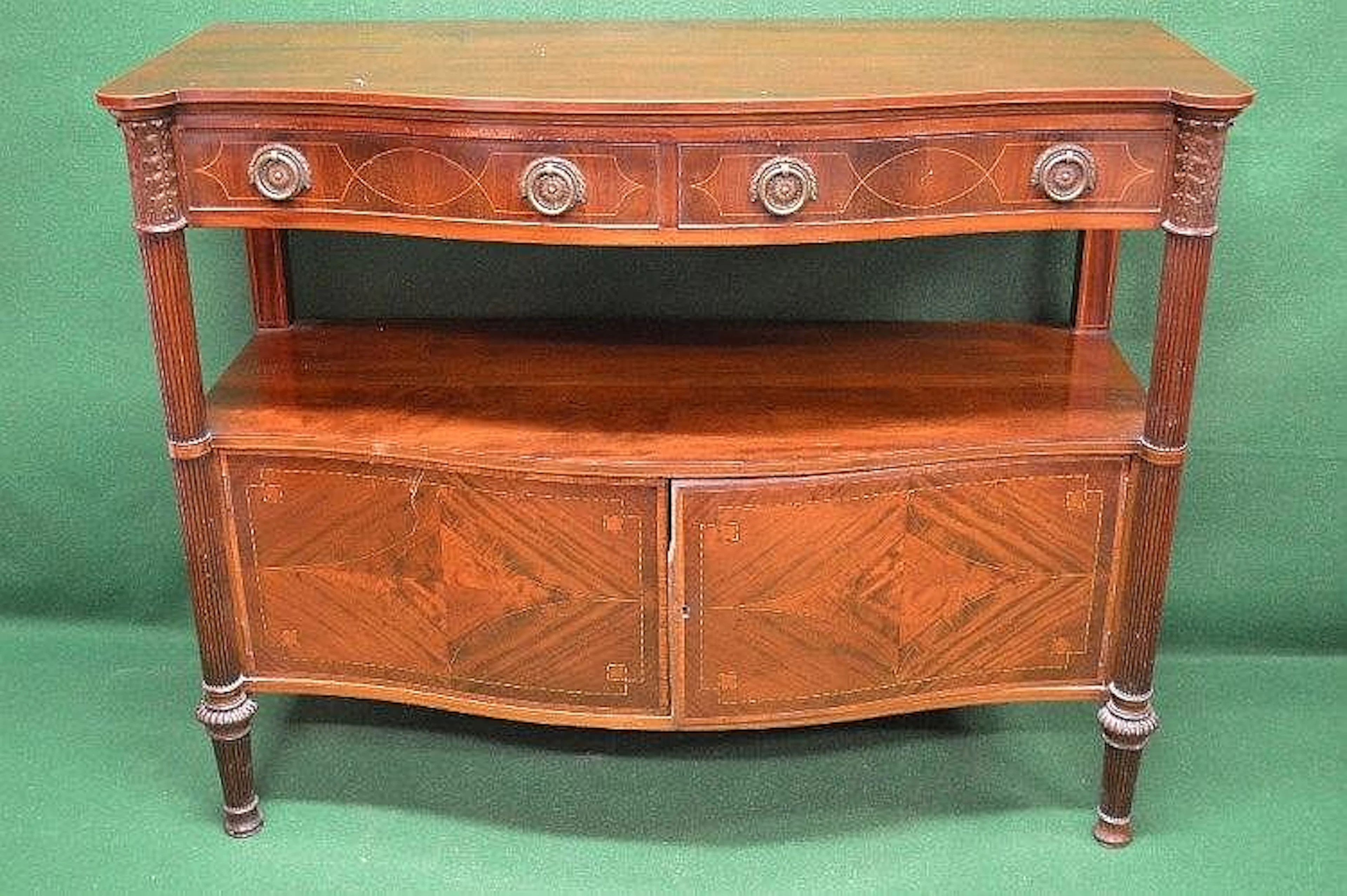Mahogany serpentine fronted inlaid buffet