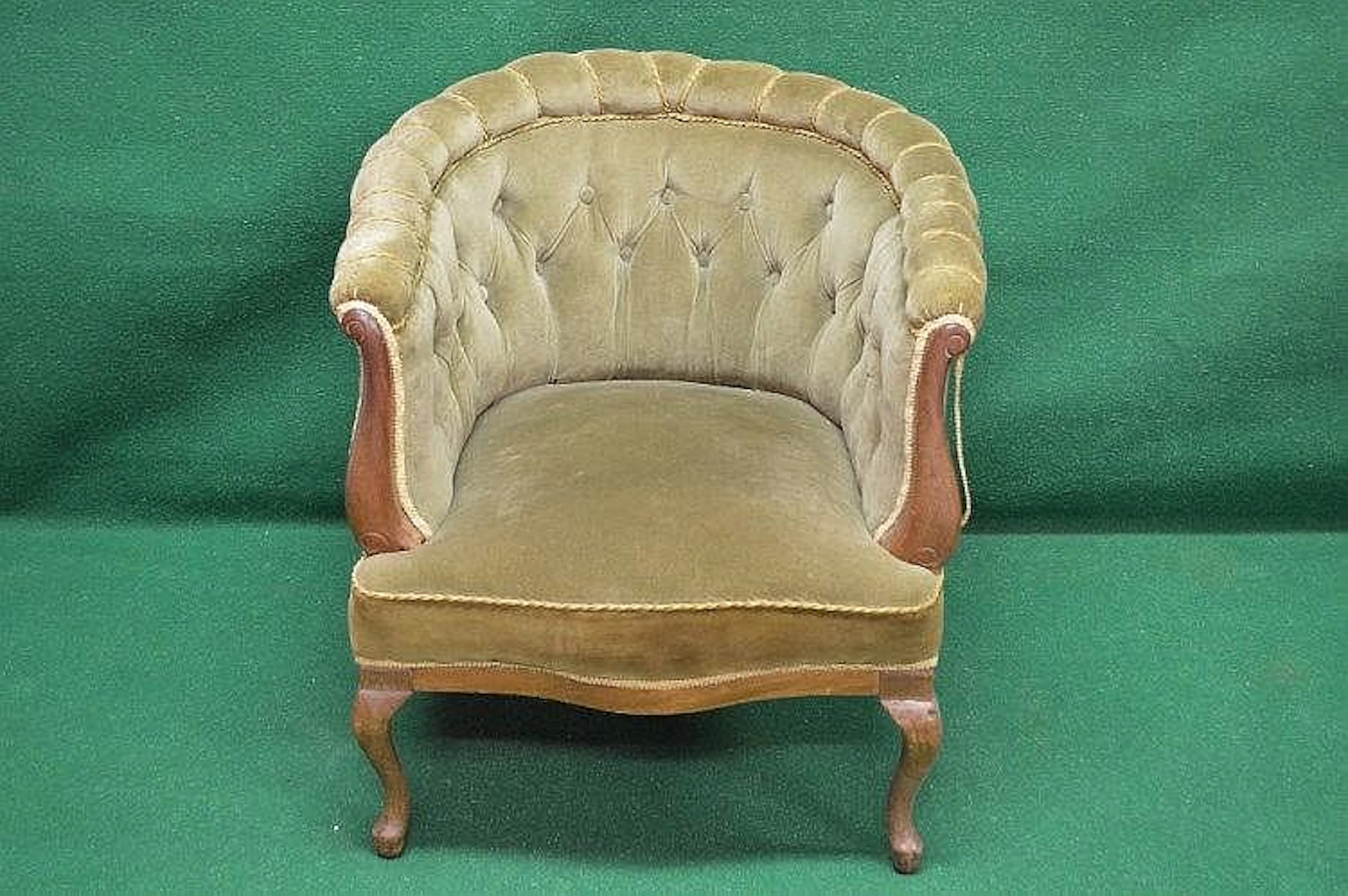 Walnut framed tub armchair with button back