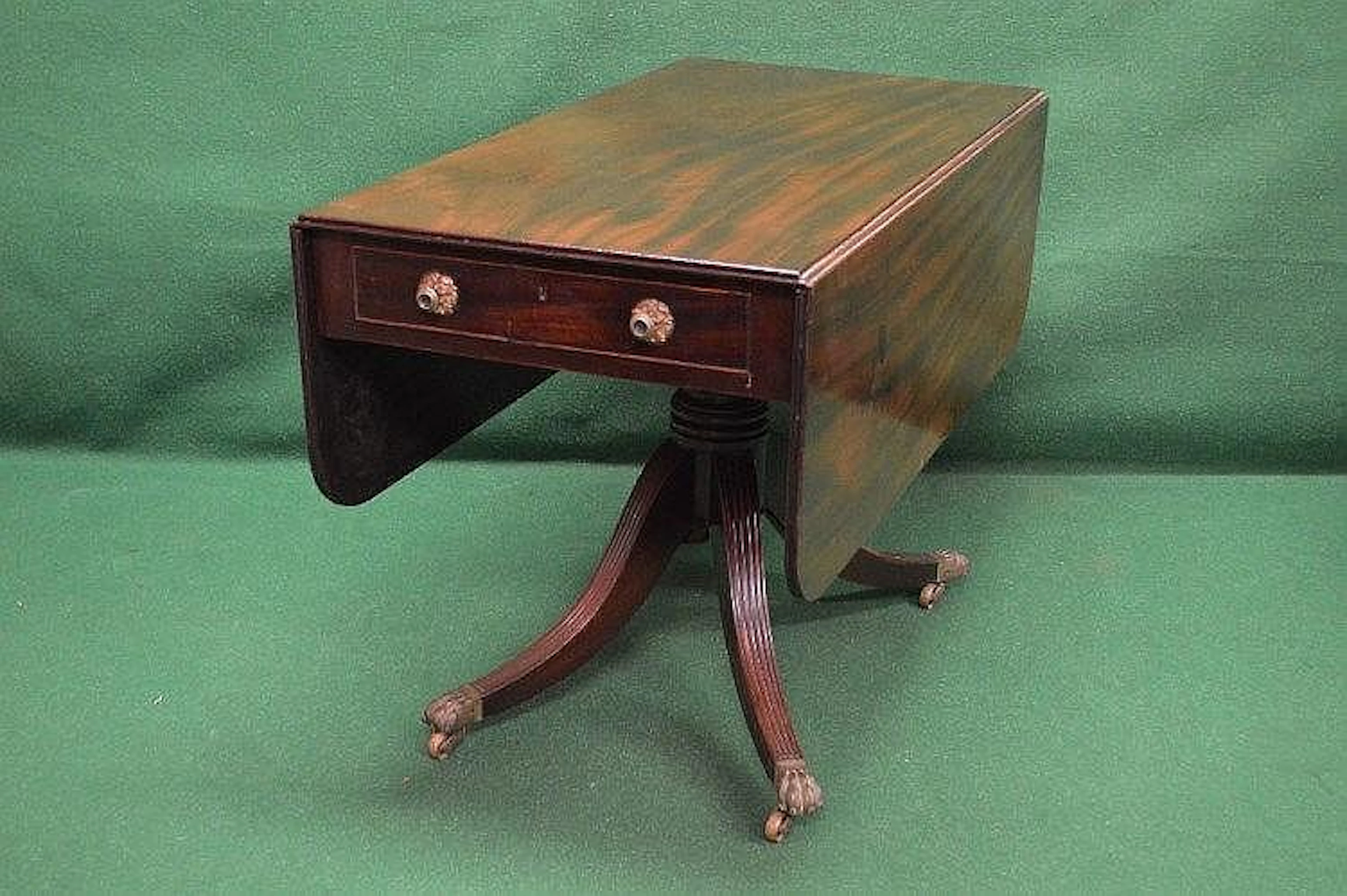Cuban mahogany two drawer Pembroke table on central...