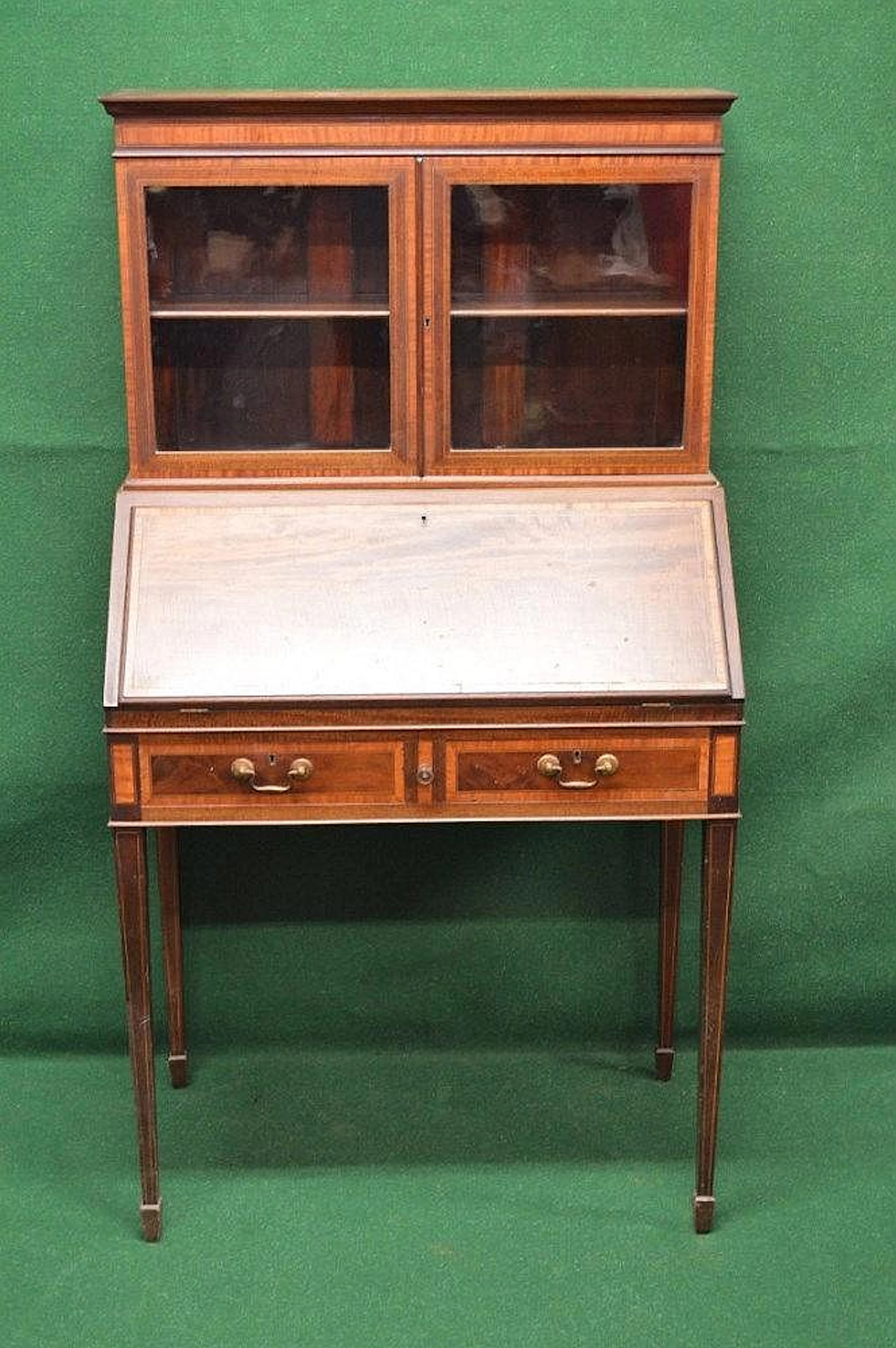 Inlaid and cross banded ladies bureau bookcase having...