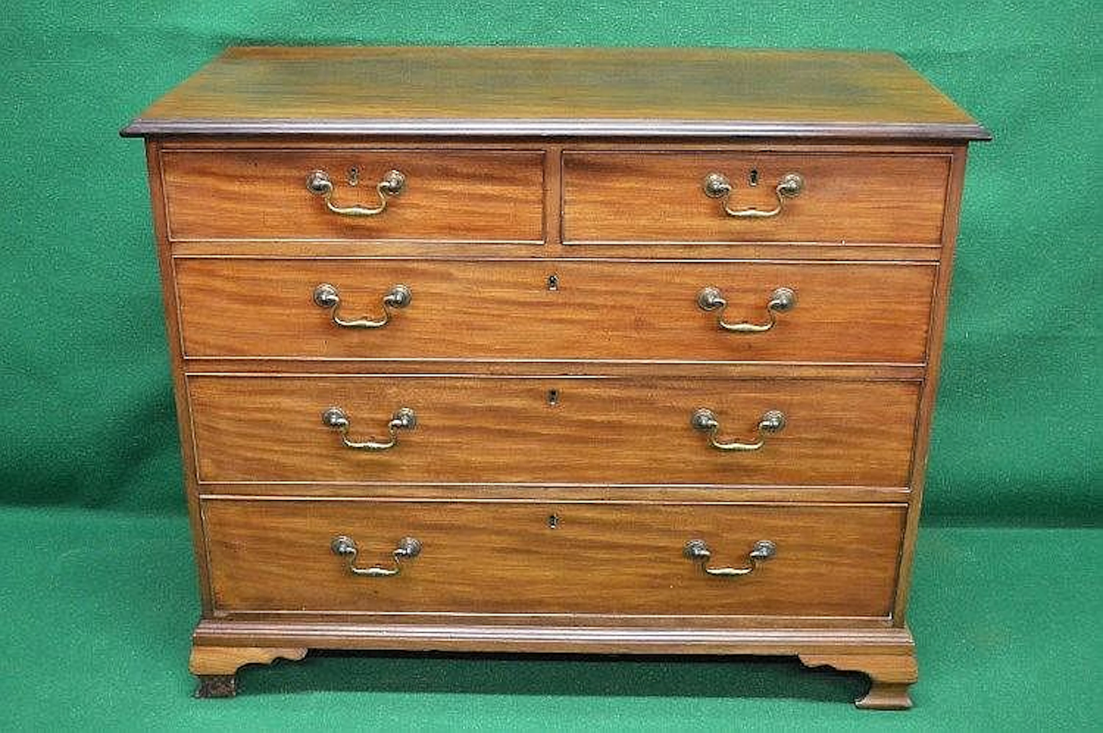 William IV mahogany chest of drawers having two short and...