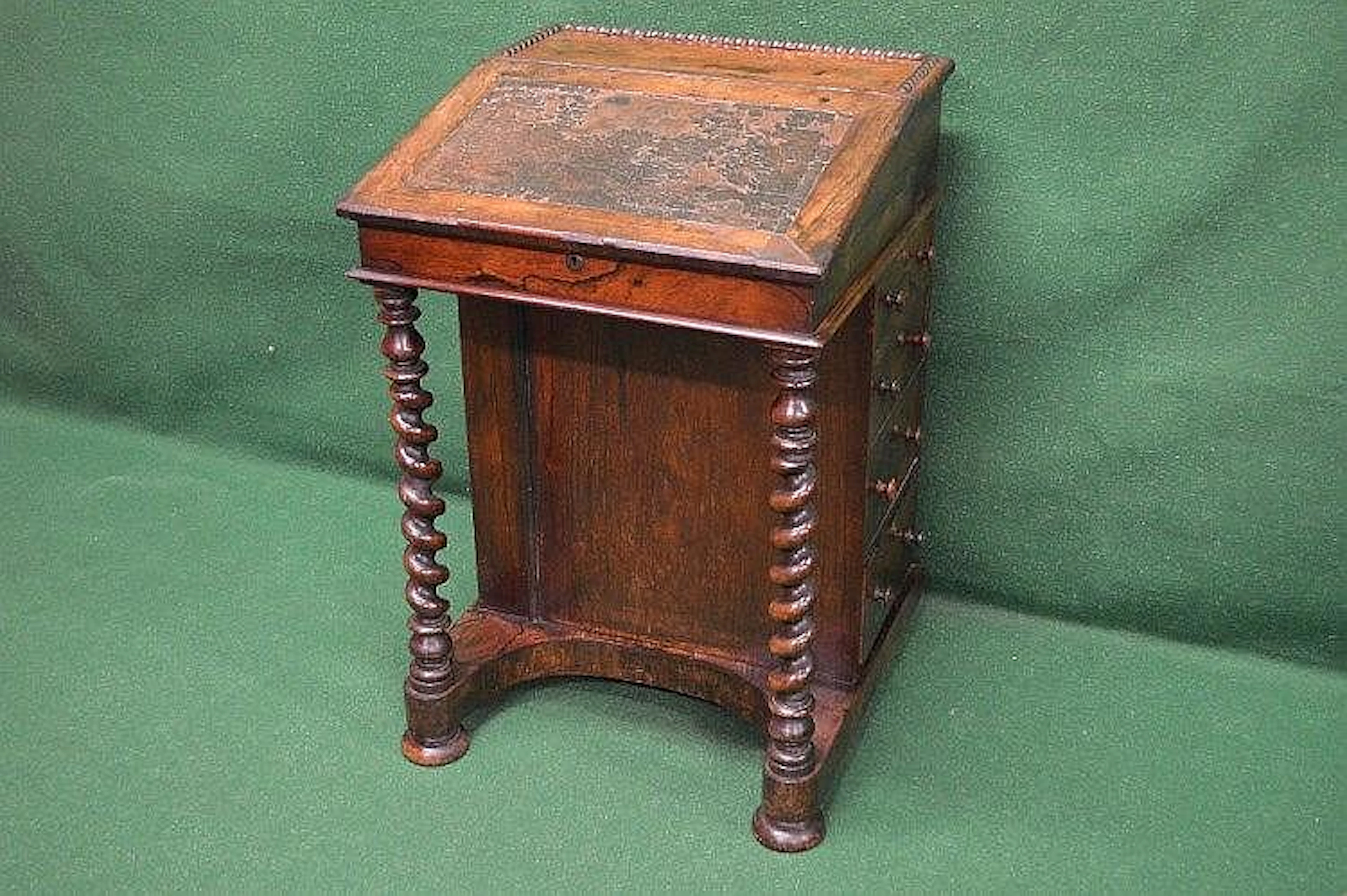 Rosewood Davenport desk having bank of four drawers to...