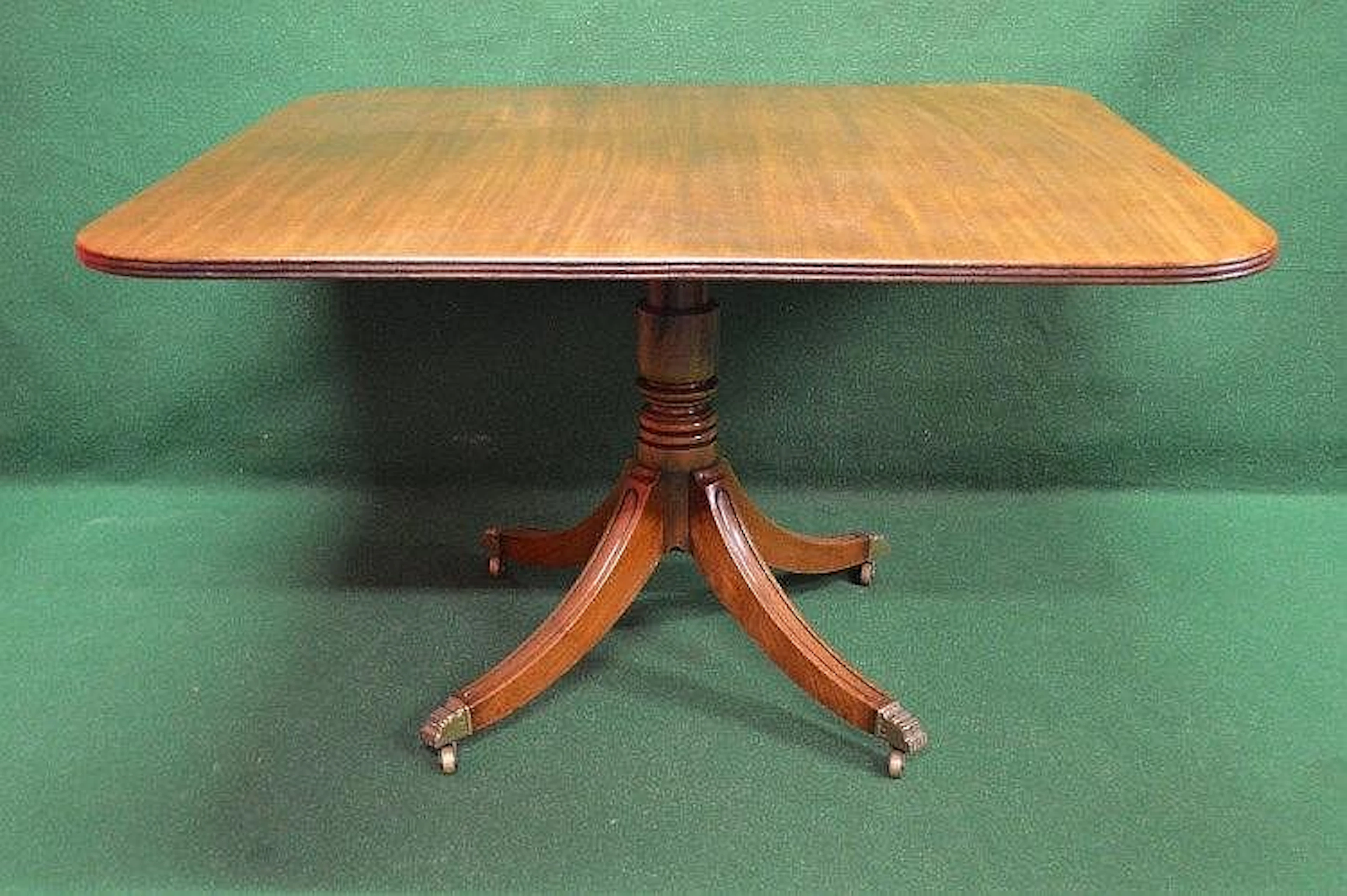Mahogany tilt top breakfast table with central support...