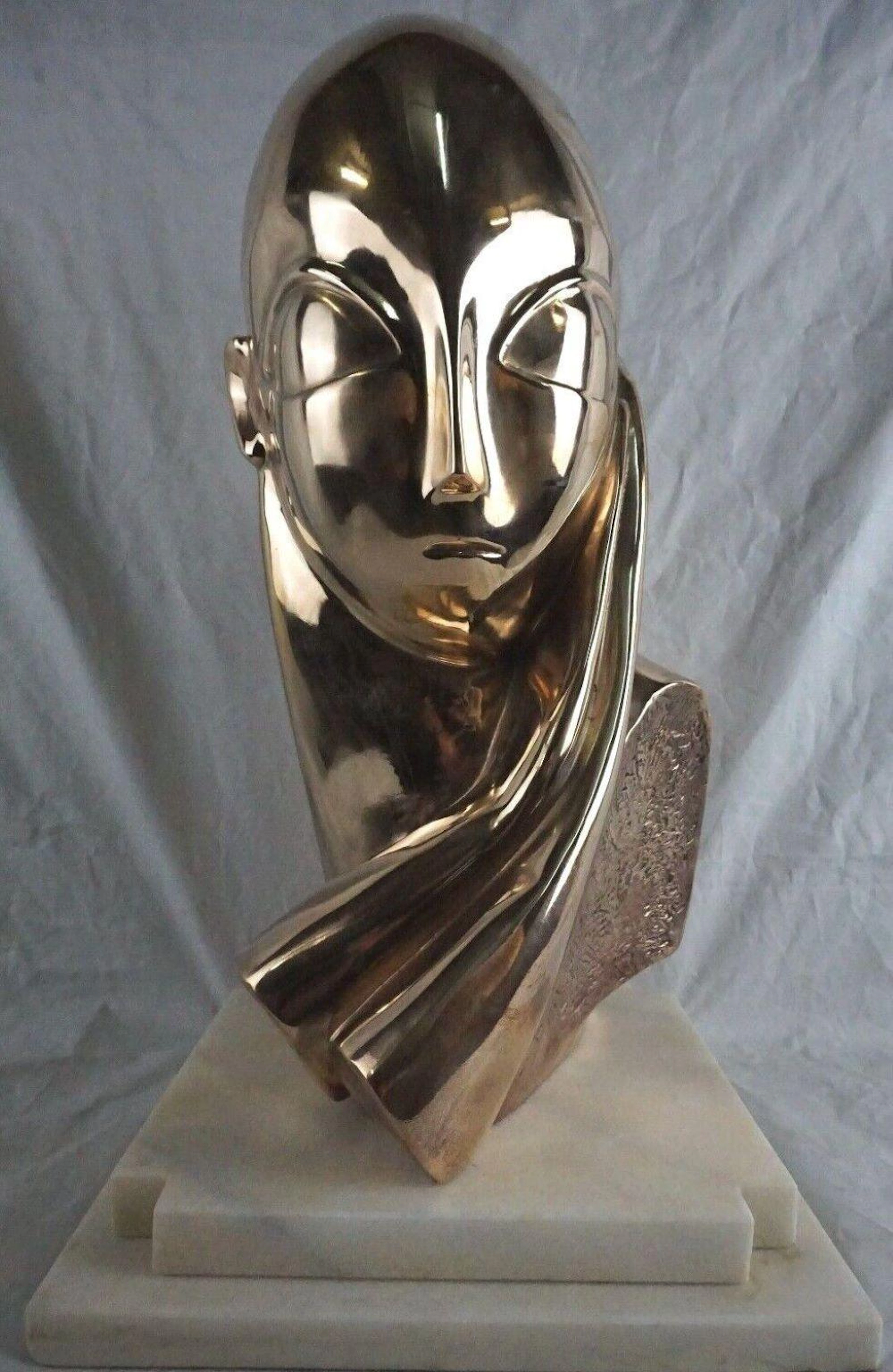 CONSTANTIN BRANCUSI [ROMANIA] 1876-1957 "MLLE POGANY" POLISHED BRONZE