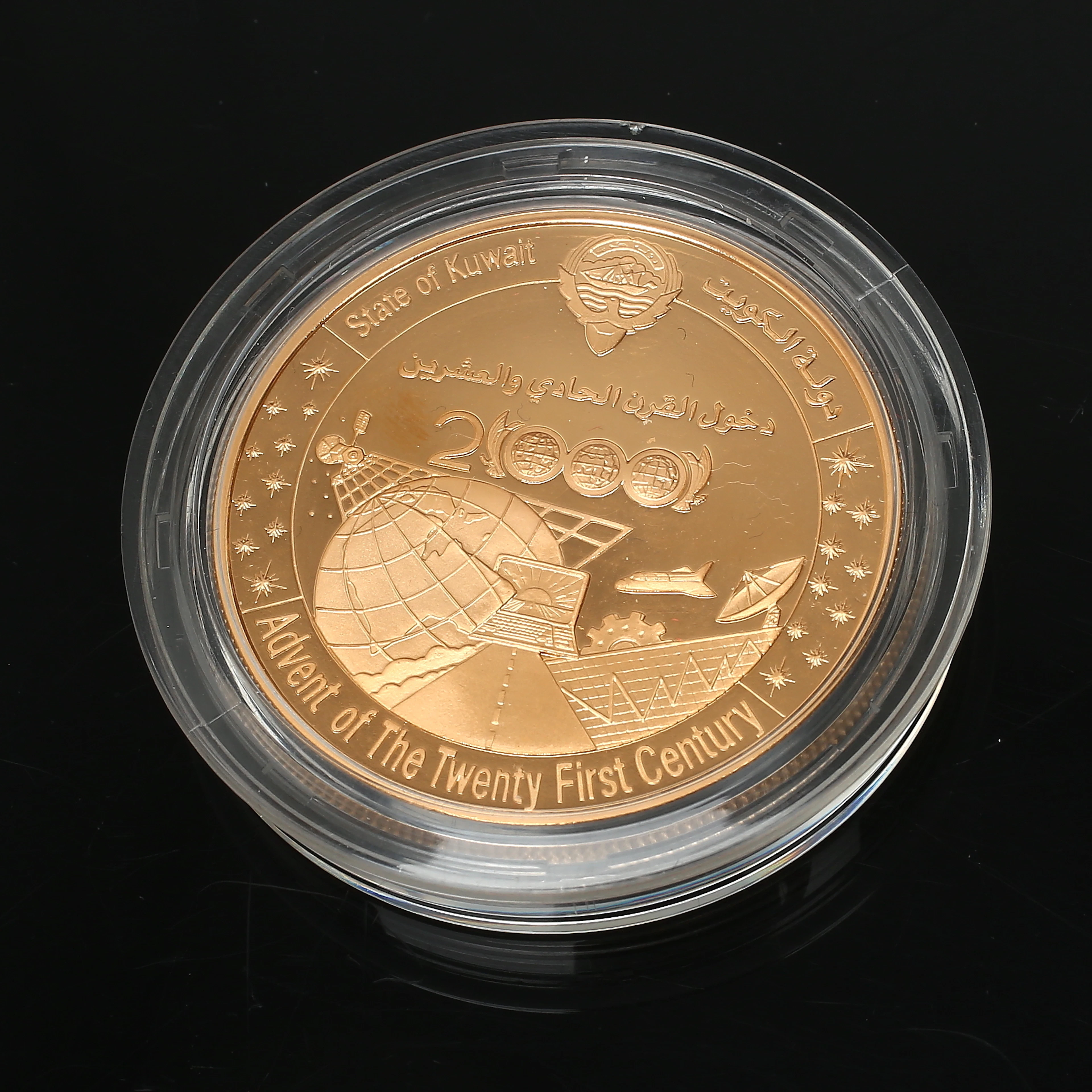 COMMEMORATIVE COIN, Advent of The Twenty First Century, Central Bank of Kuwait. Weight 47.54 grams. 22 karat gold.