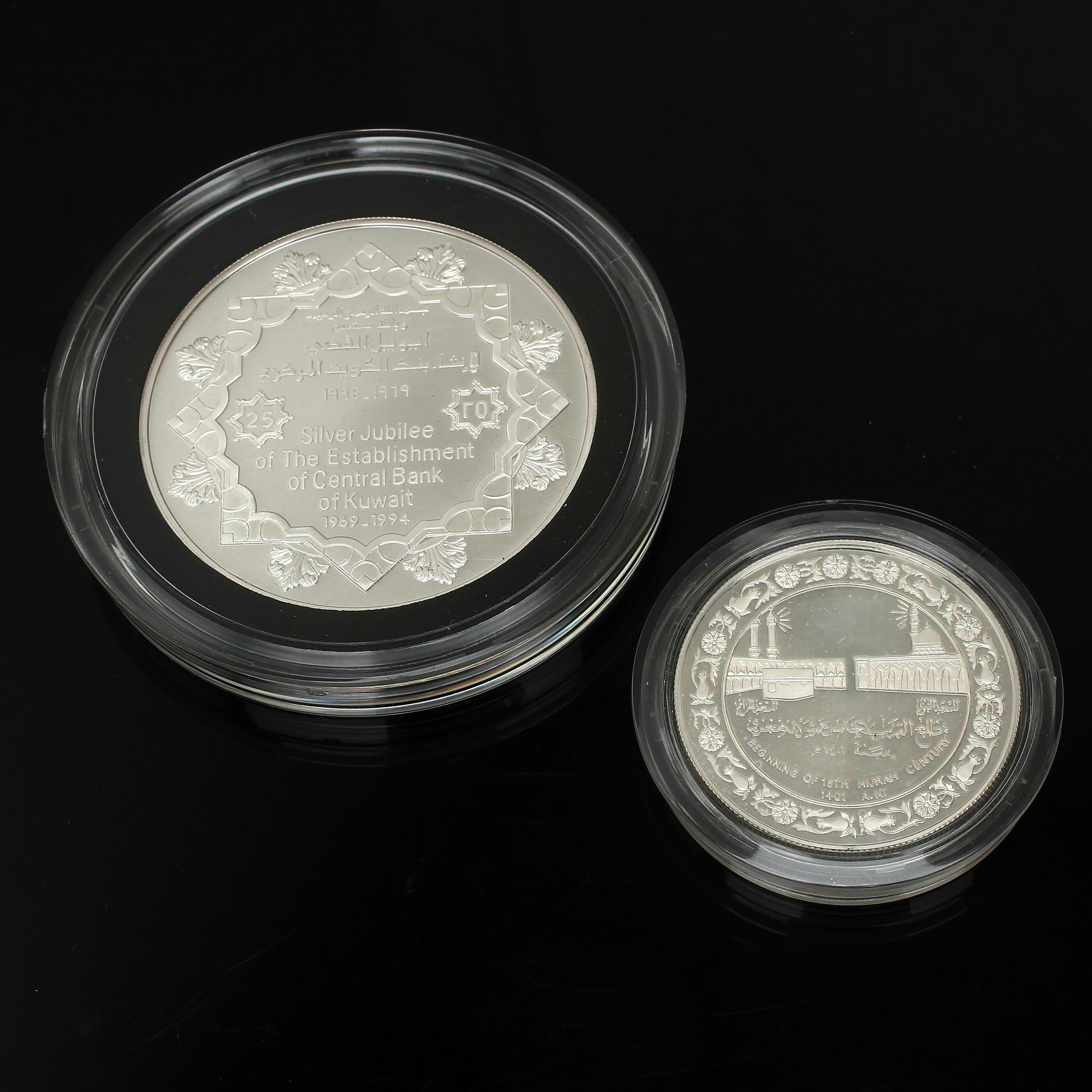 COMMEMORATIVE COINS, 2 pieces, silver, Central Bank of Kuwait. Total weight 101.3 grams.