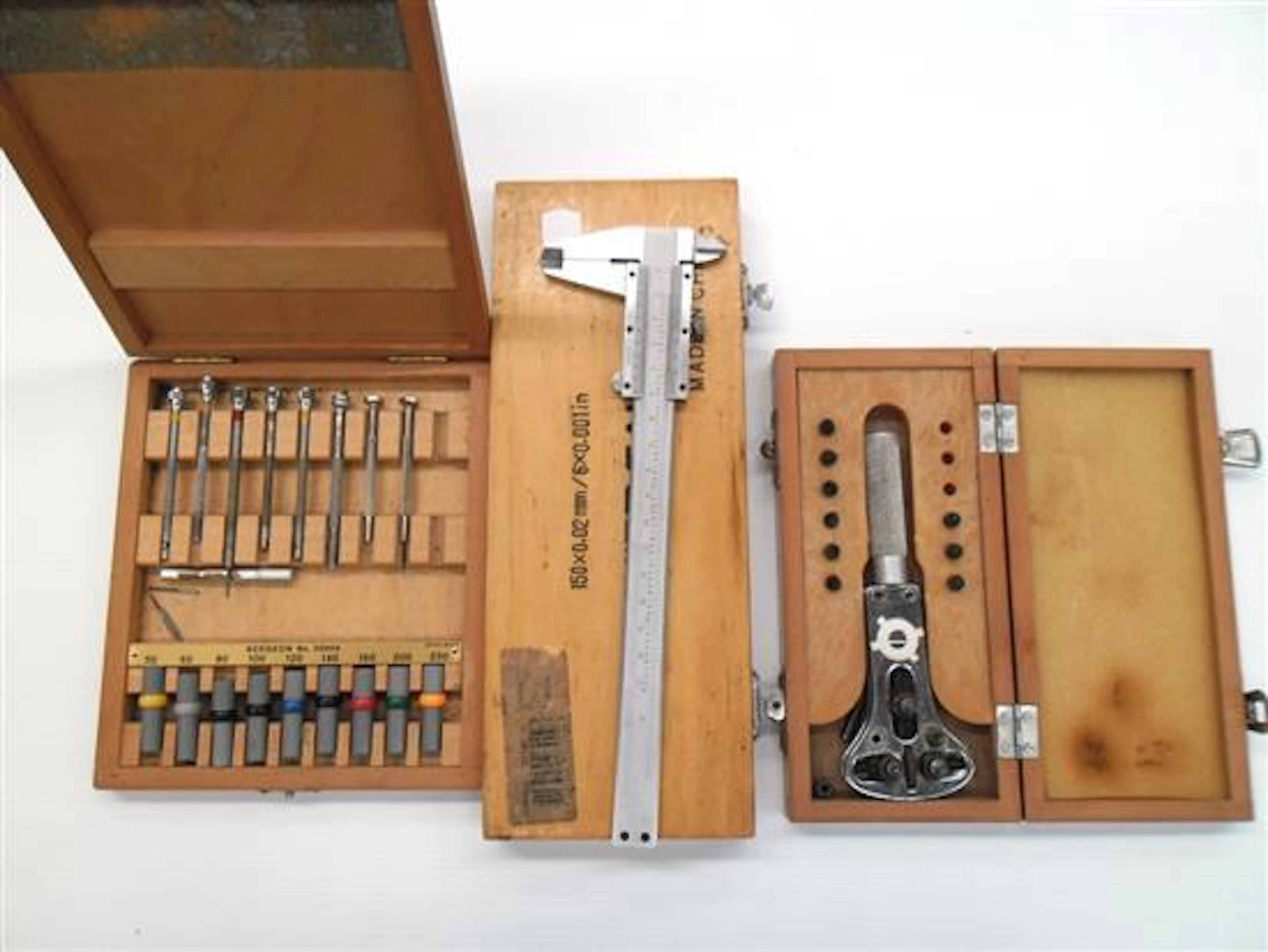 A Universal Watch Back Opening Tool with extra fittings...